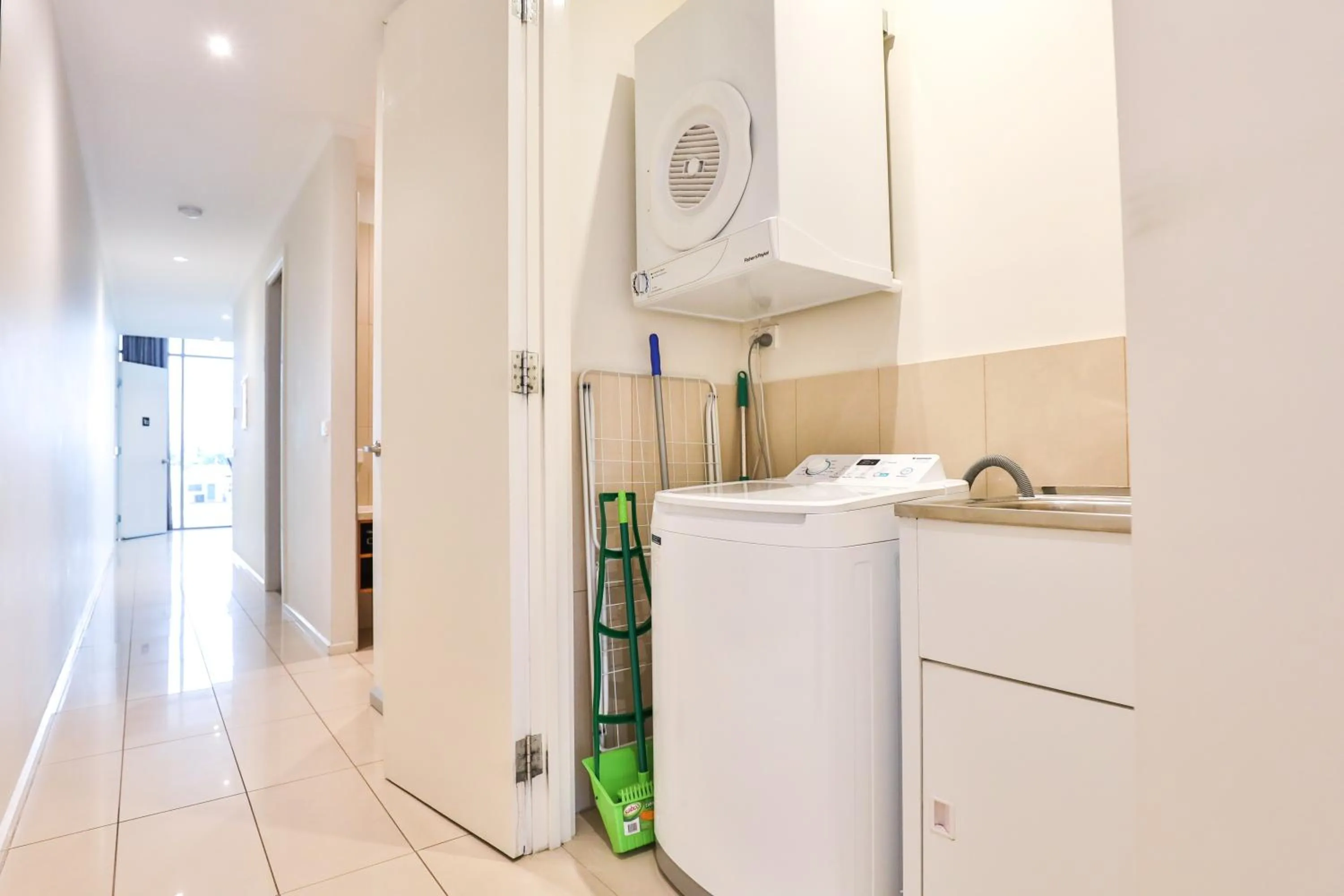 washing machine in Indulge Apartments - Langtree