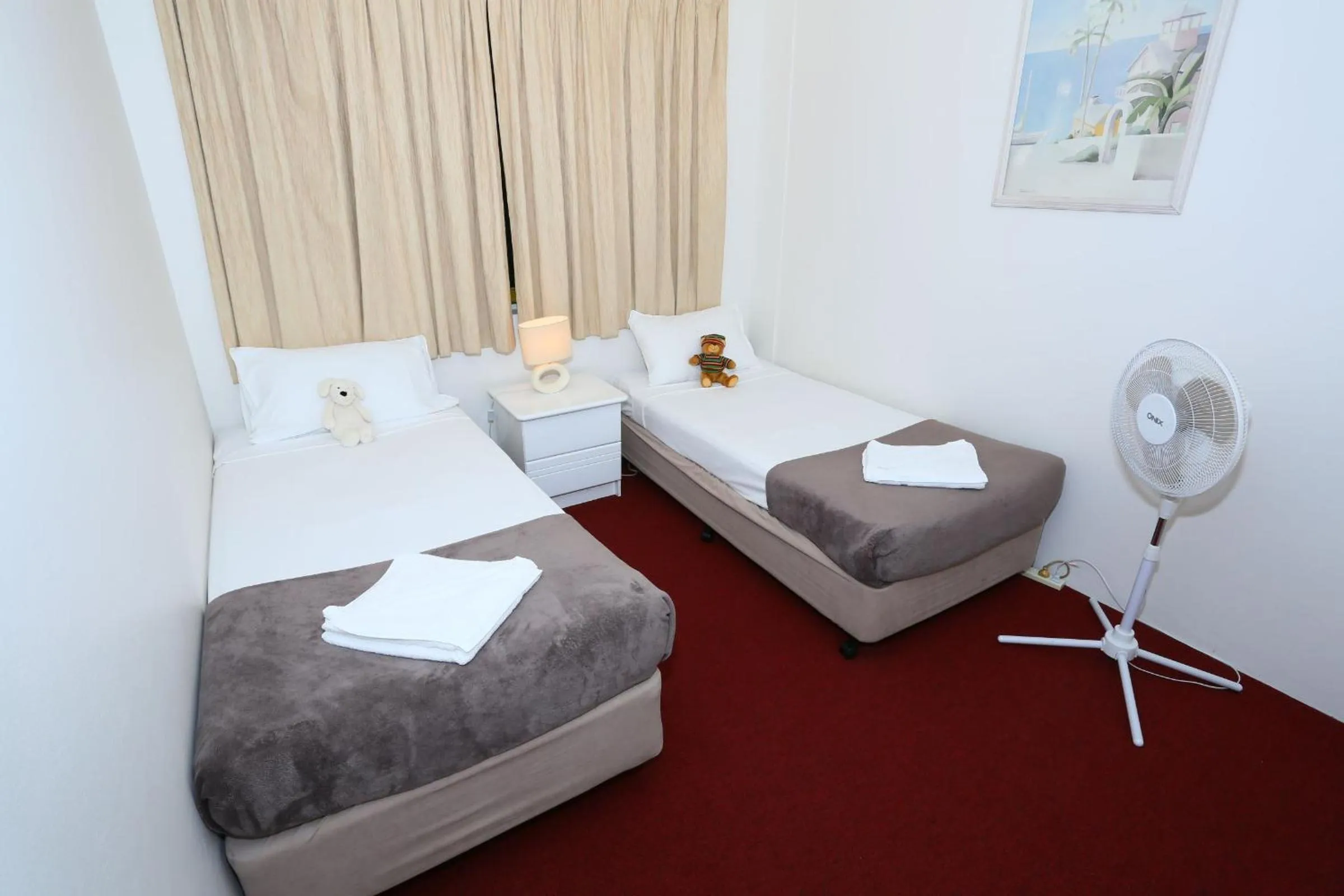 Photo of the whole room, Bed in St Tropez Resort