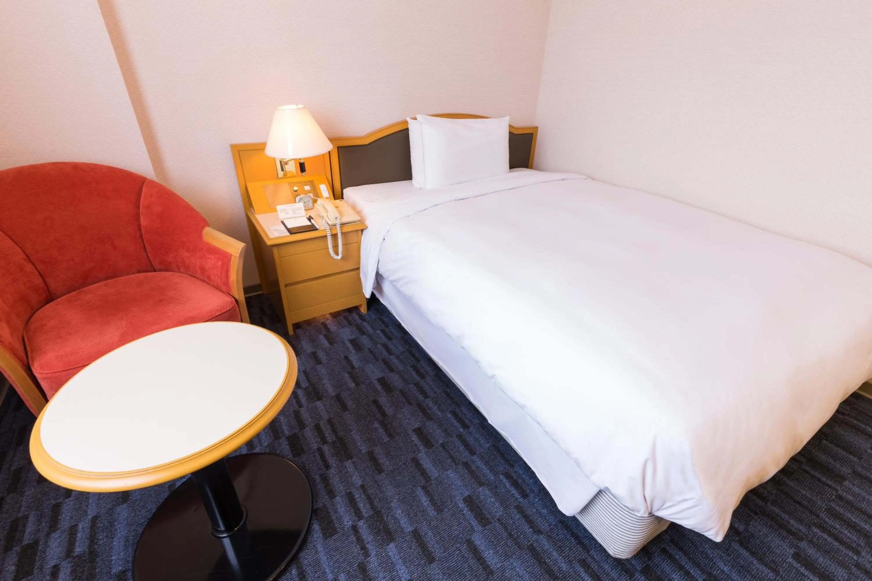 Bed in Hotel Sunroute Taipei