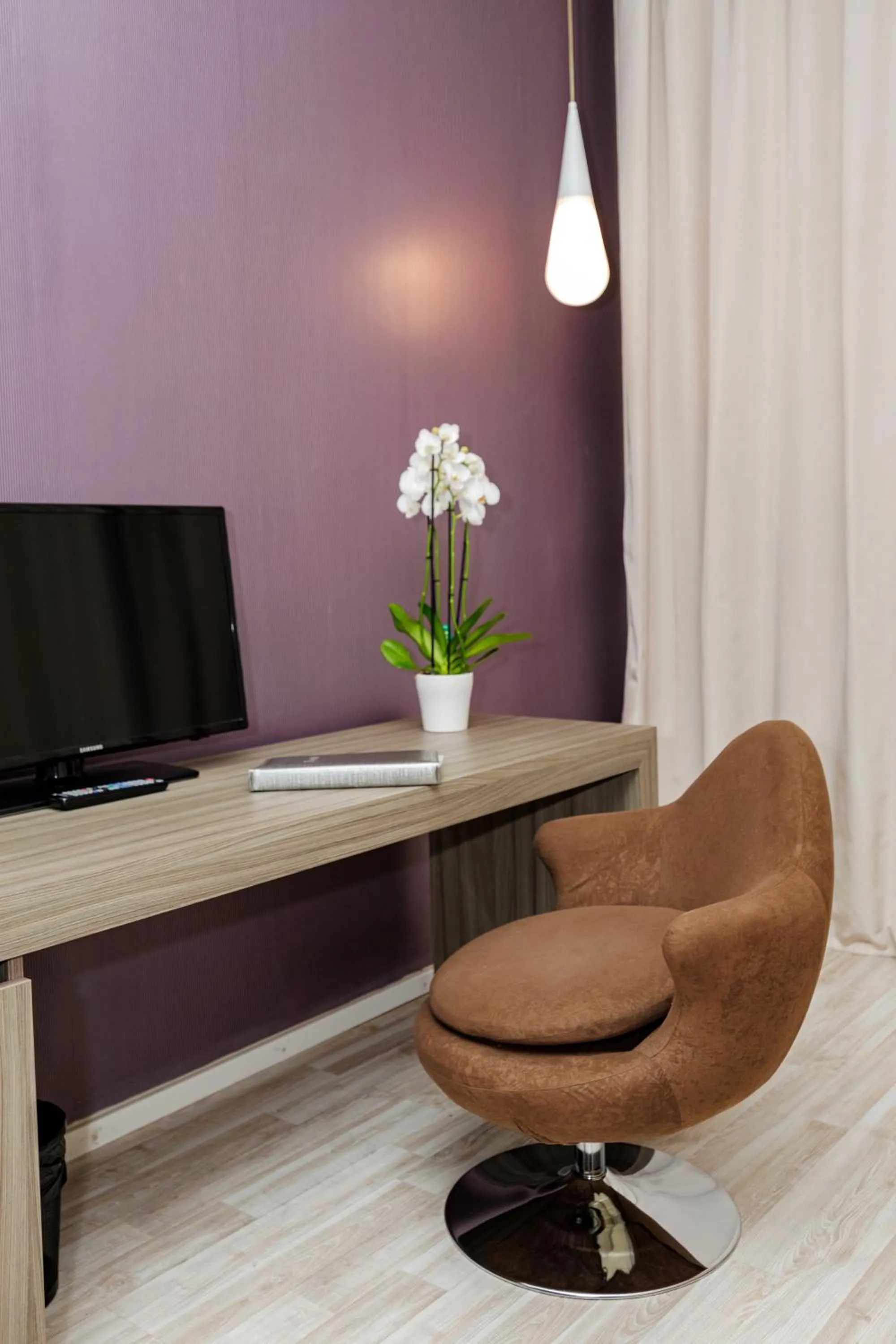 Communal lounge/ TV room in Sky Hotel Tirana