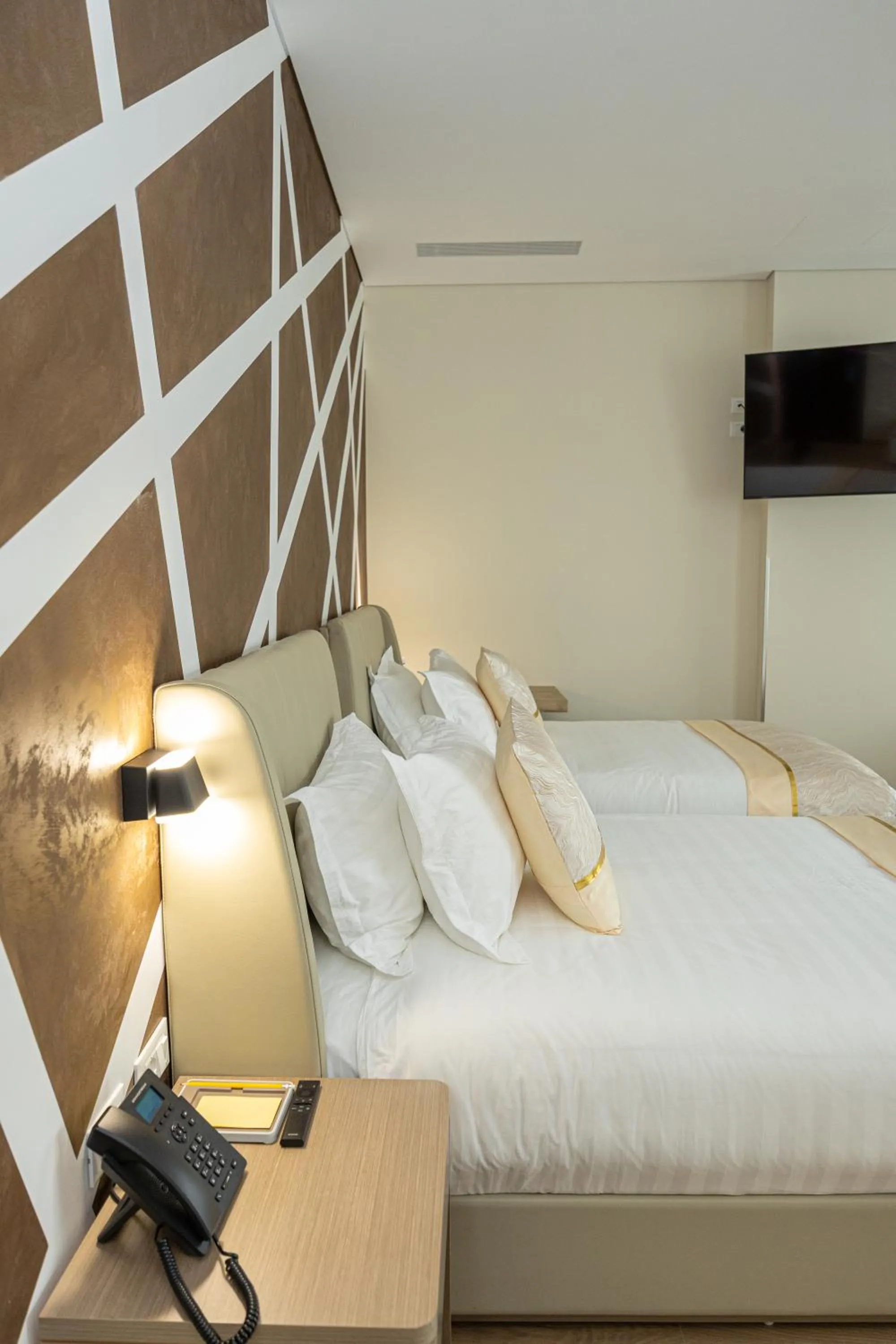 Communal lounge/ TV room, Bed in Sky Hotel Tirana