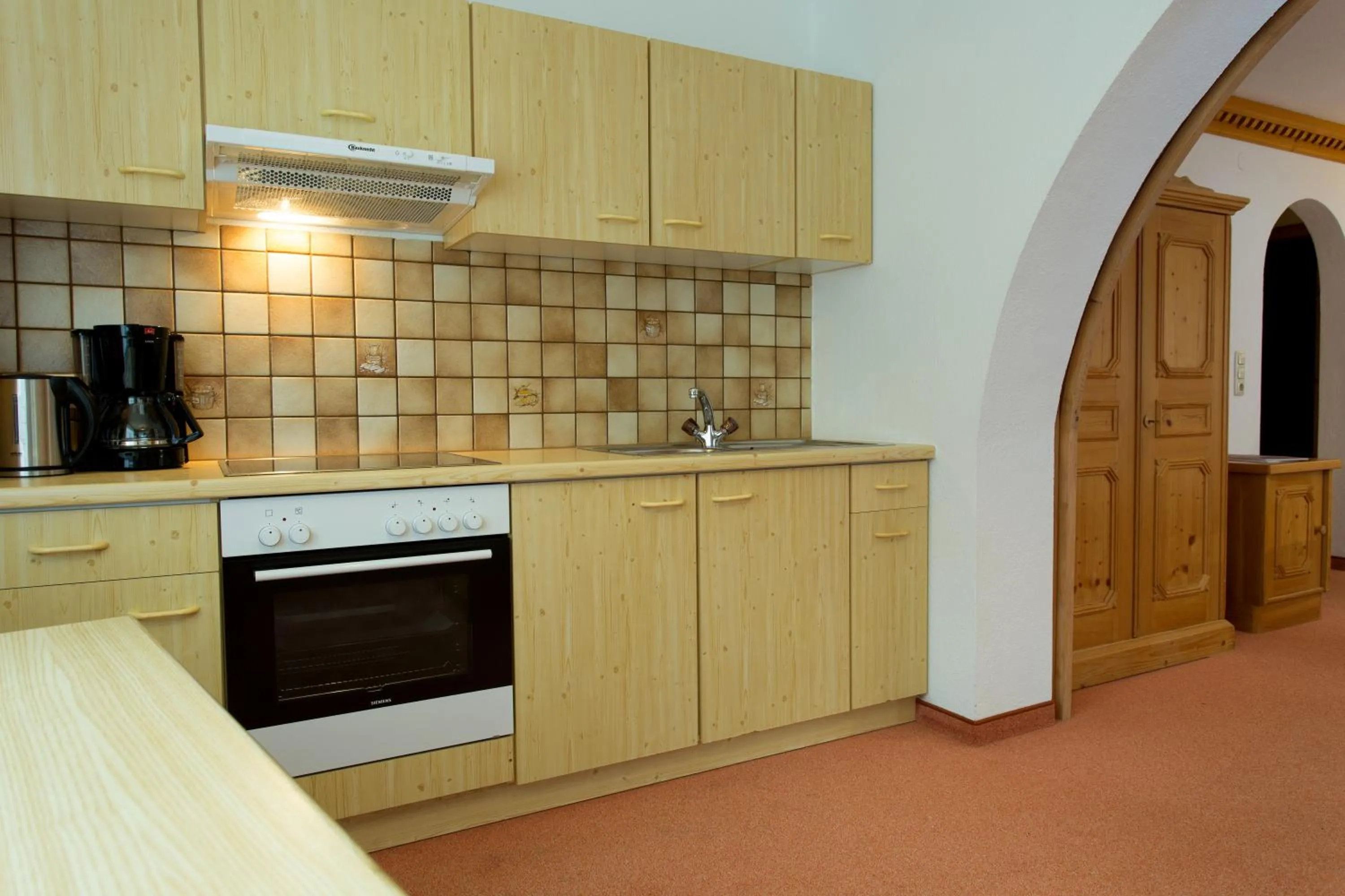 Kitchen or kitchenette in Aparthotel Alpin Life
