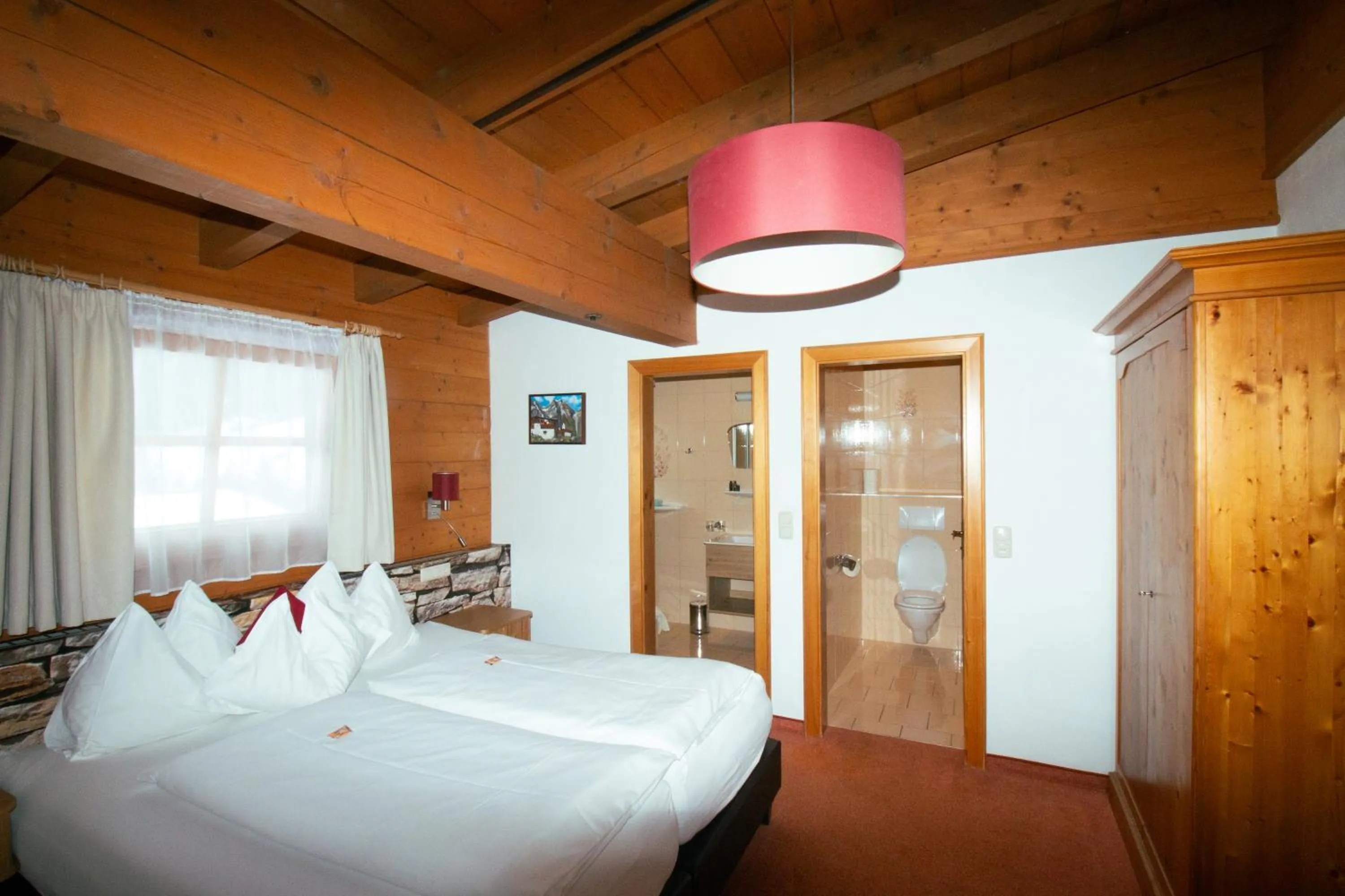 Bed in Aparthotel Alpin Life