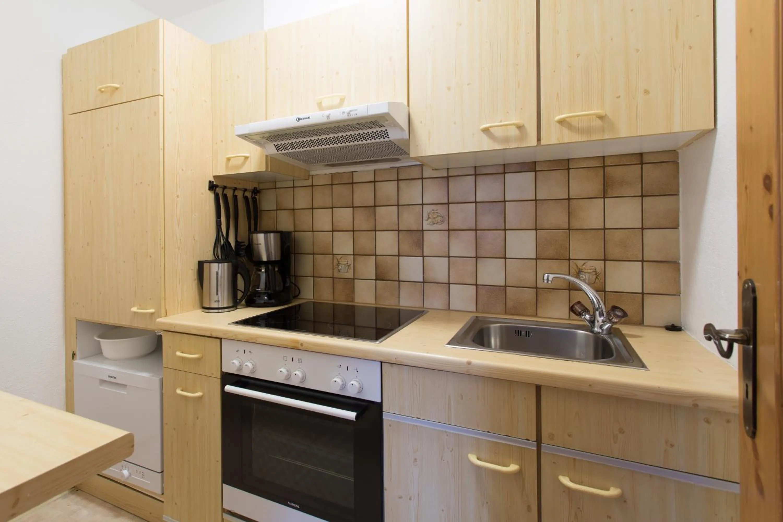 Kitchen or kitchenette in Aparthotel Alpin Life