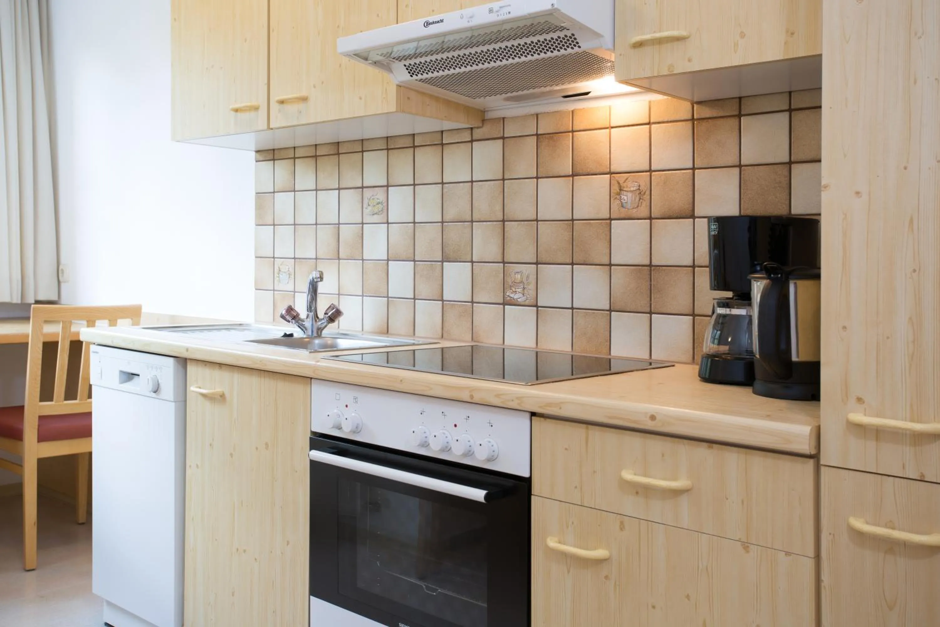 Kitchen or kitchenette in Aparthotel Alpin Life