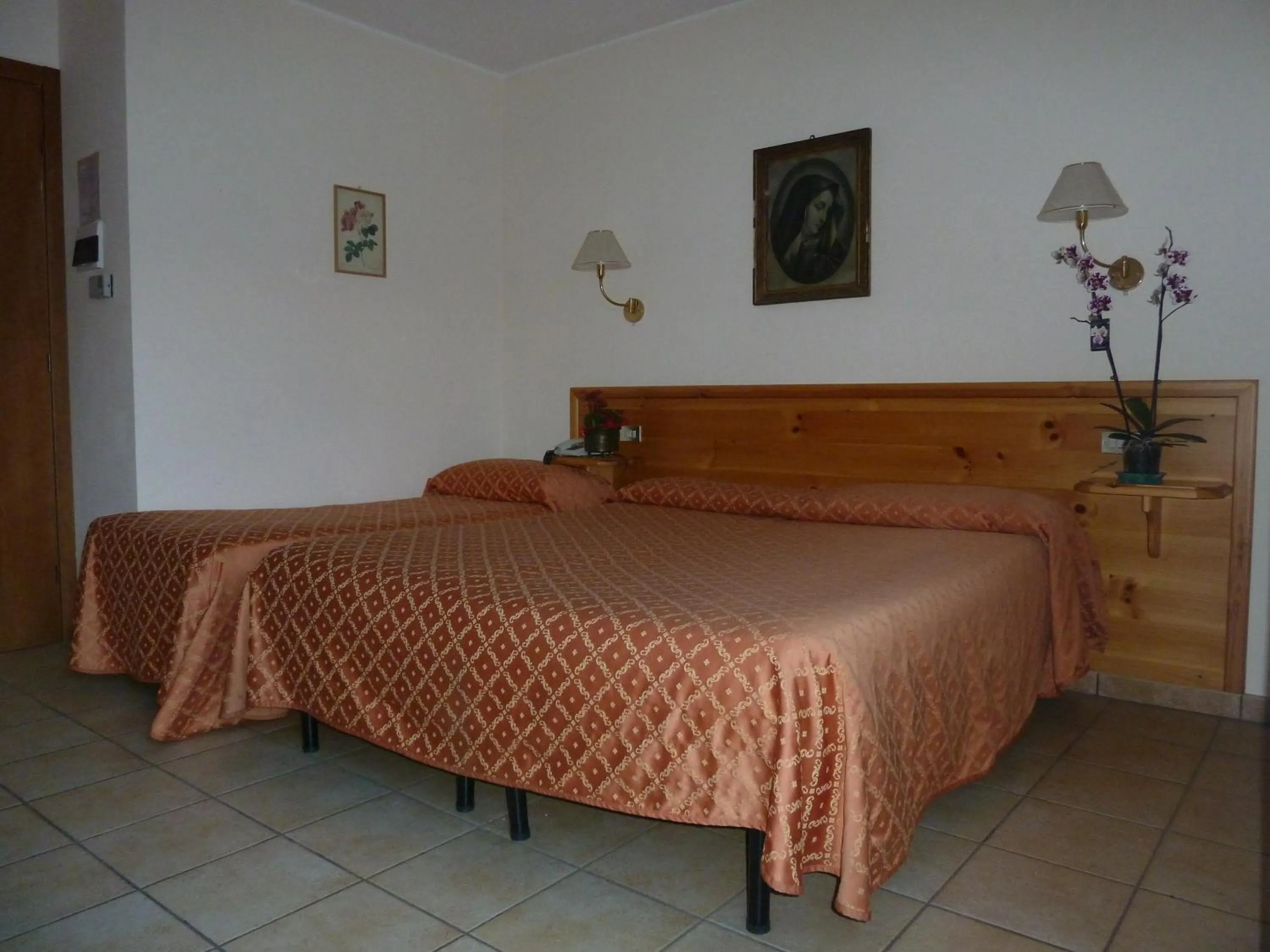 Bed in Hotel Le Verger