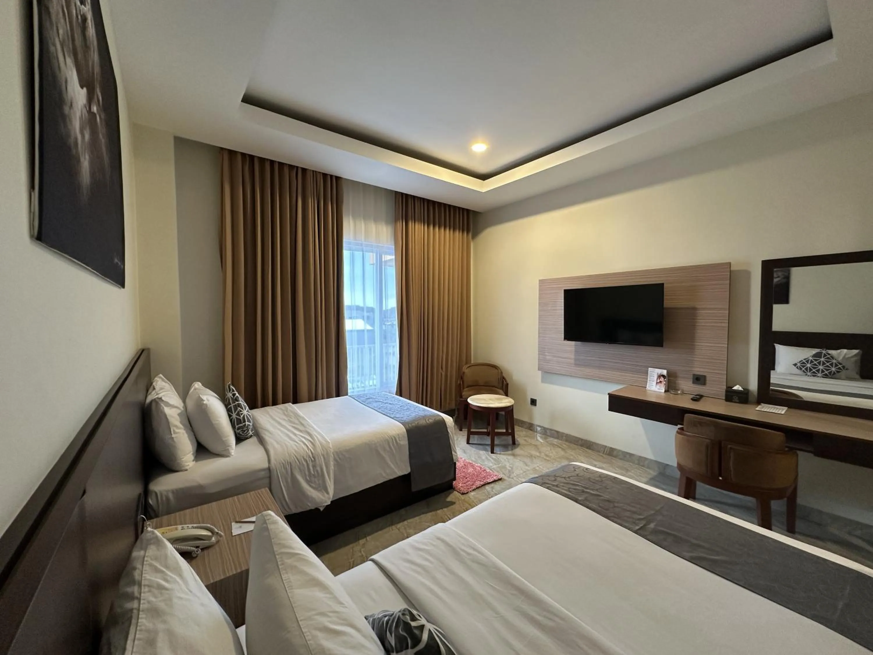 Bed in Vega Prime Hotel & Convention