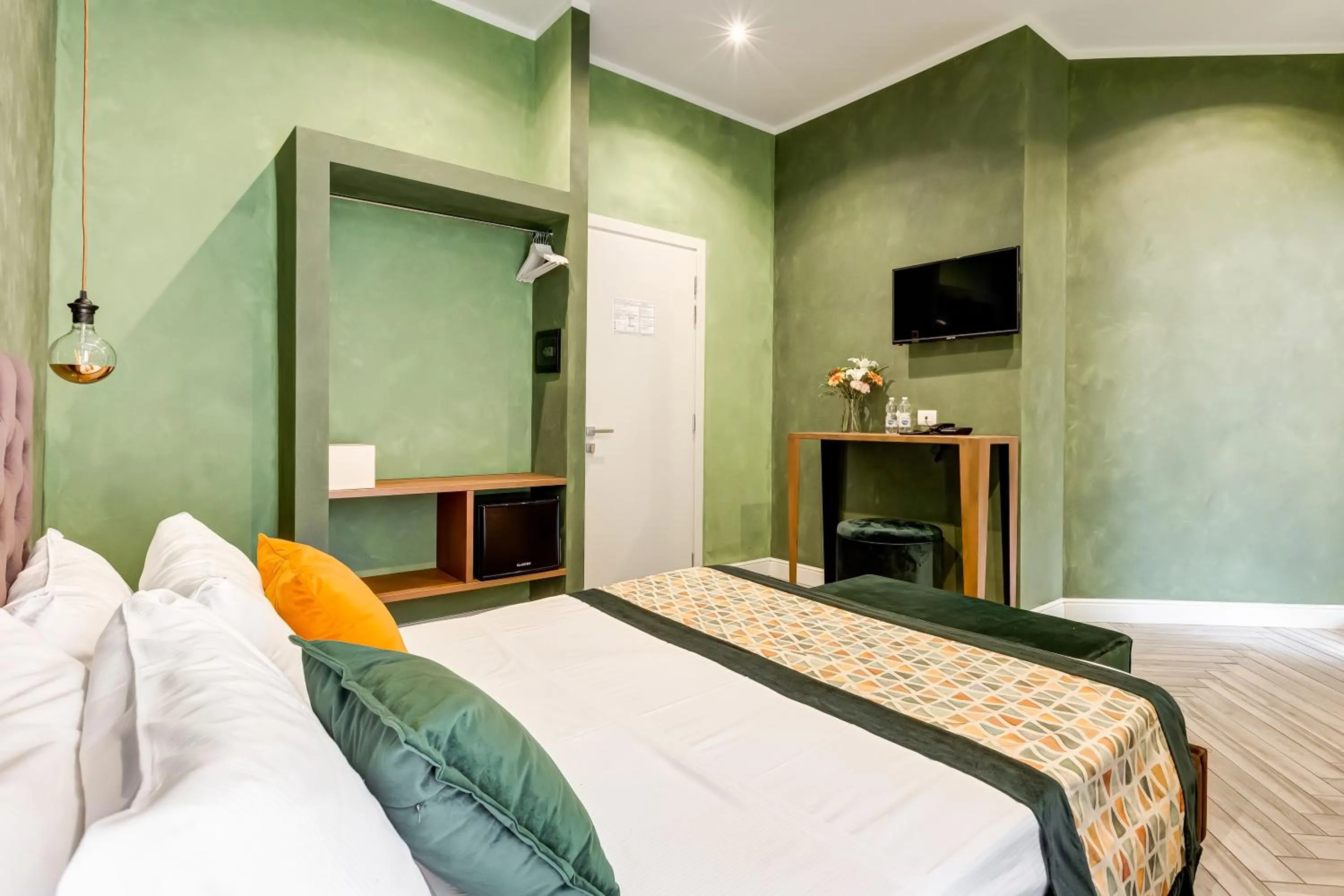 Bed in Ripetta Natural Suites