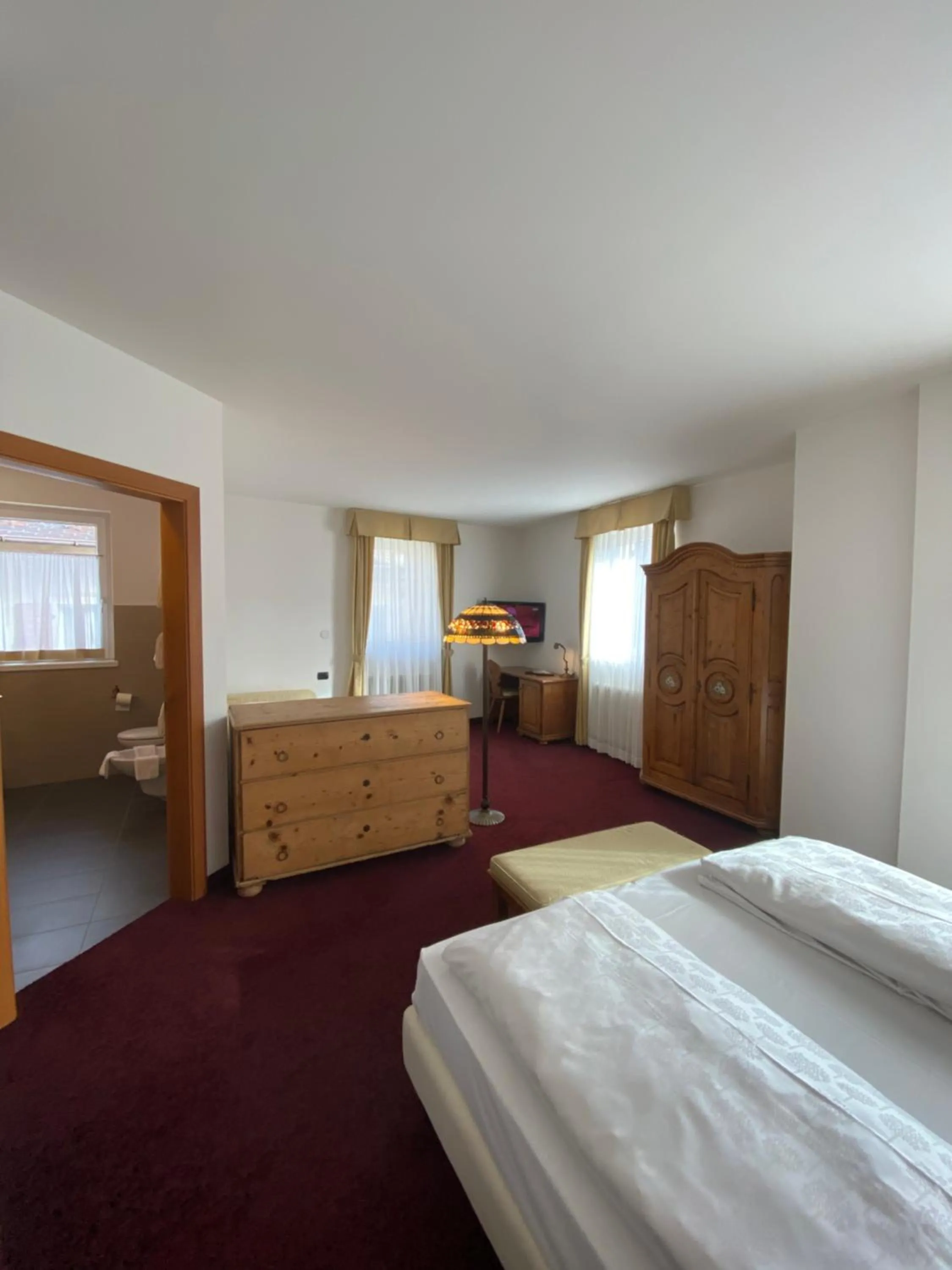 Bed in Folgaria Post Hotel