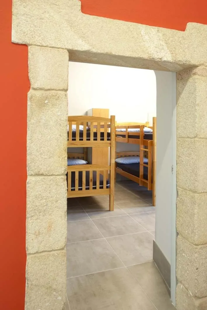 Photo of the whole room, Bed in Albergue Monasterio de La Magdalena