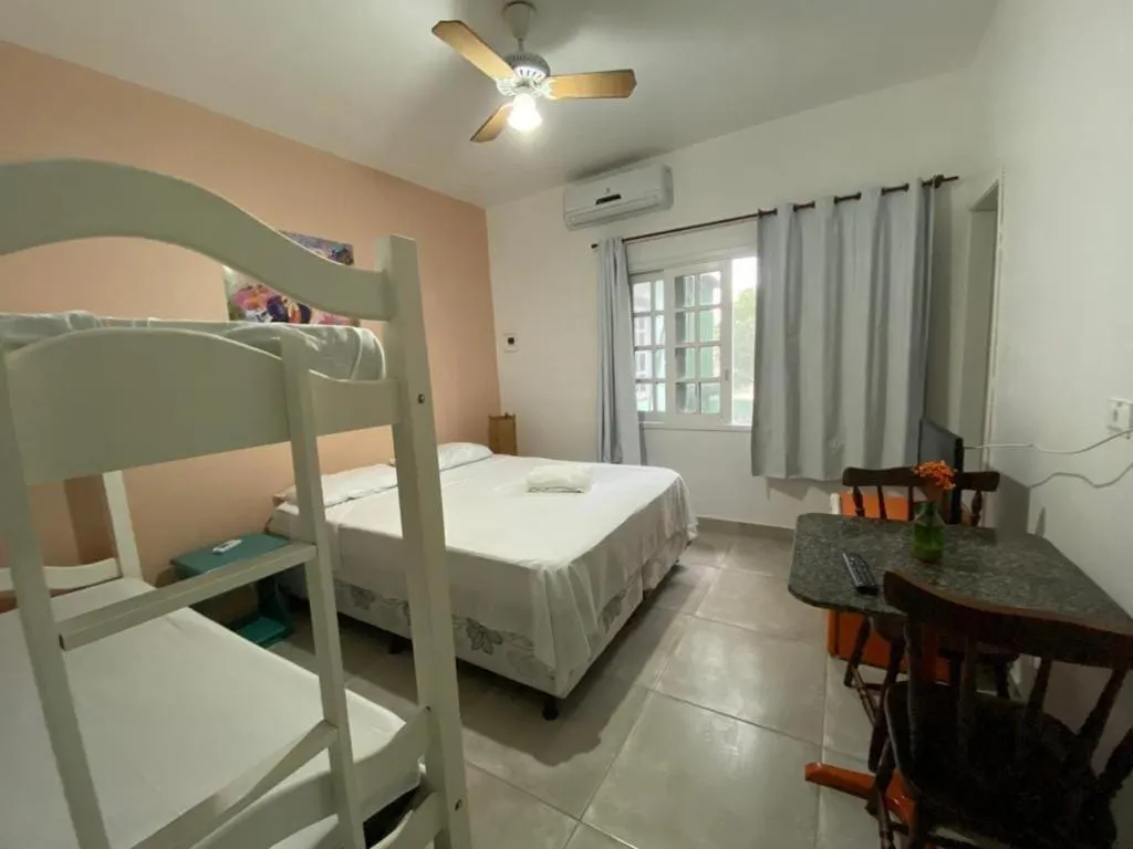 Bed in Pousada Liras da Poesia