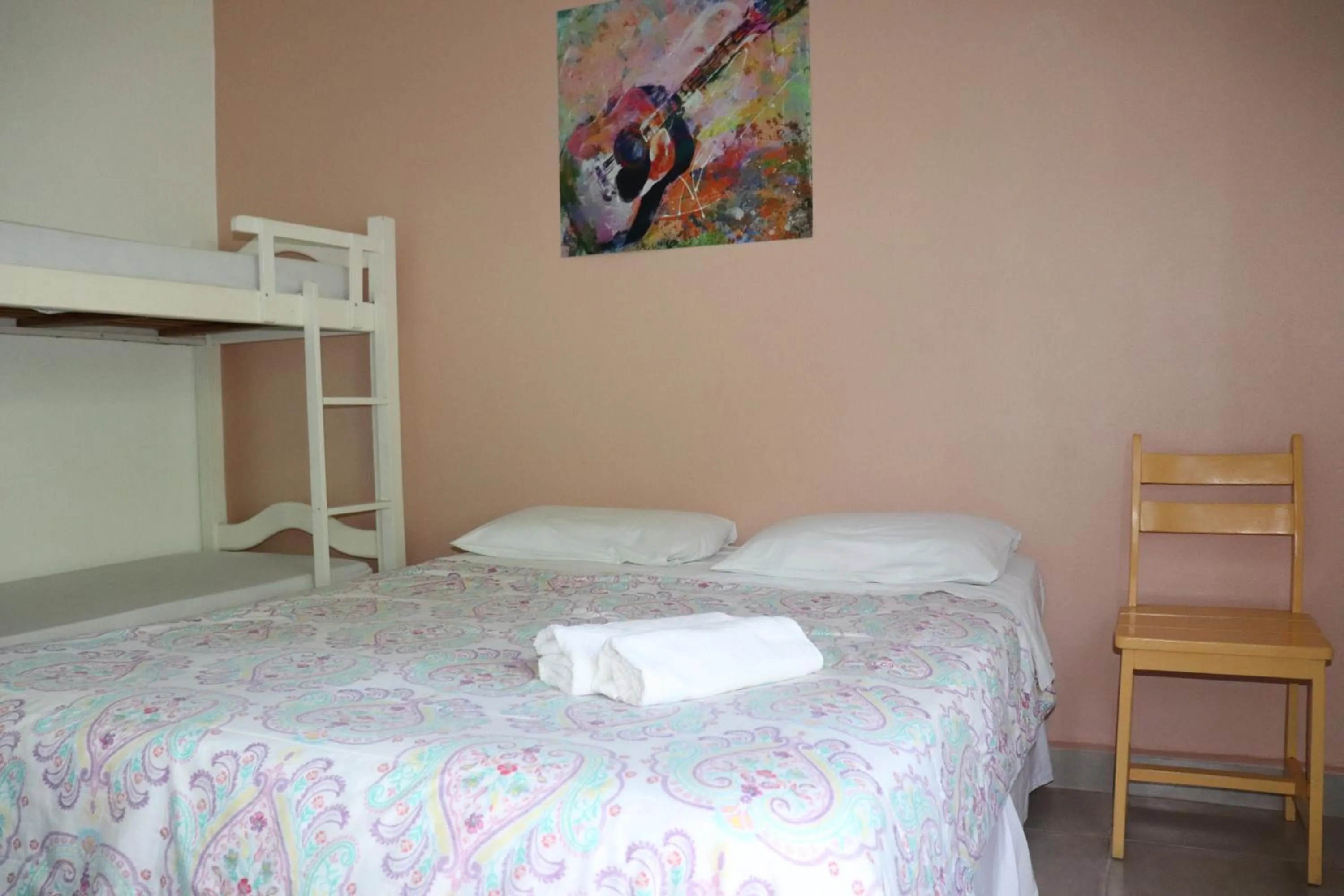 Bed in Pousada Liras da Poesia