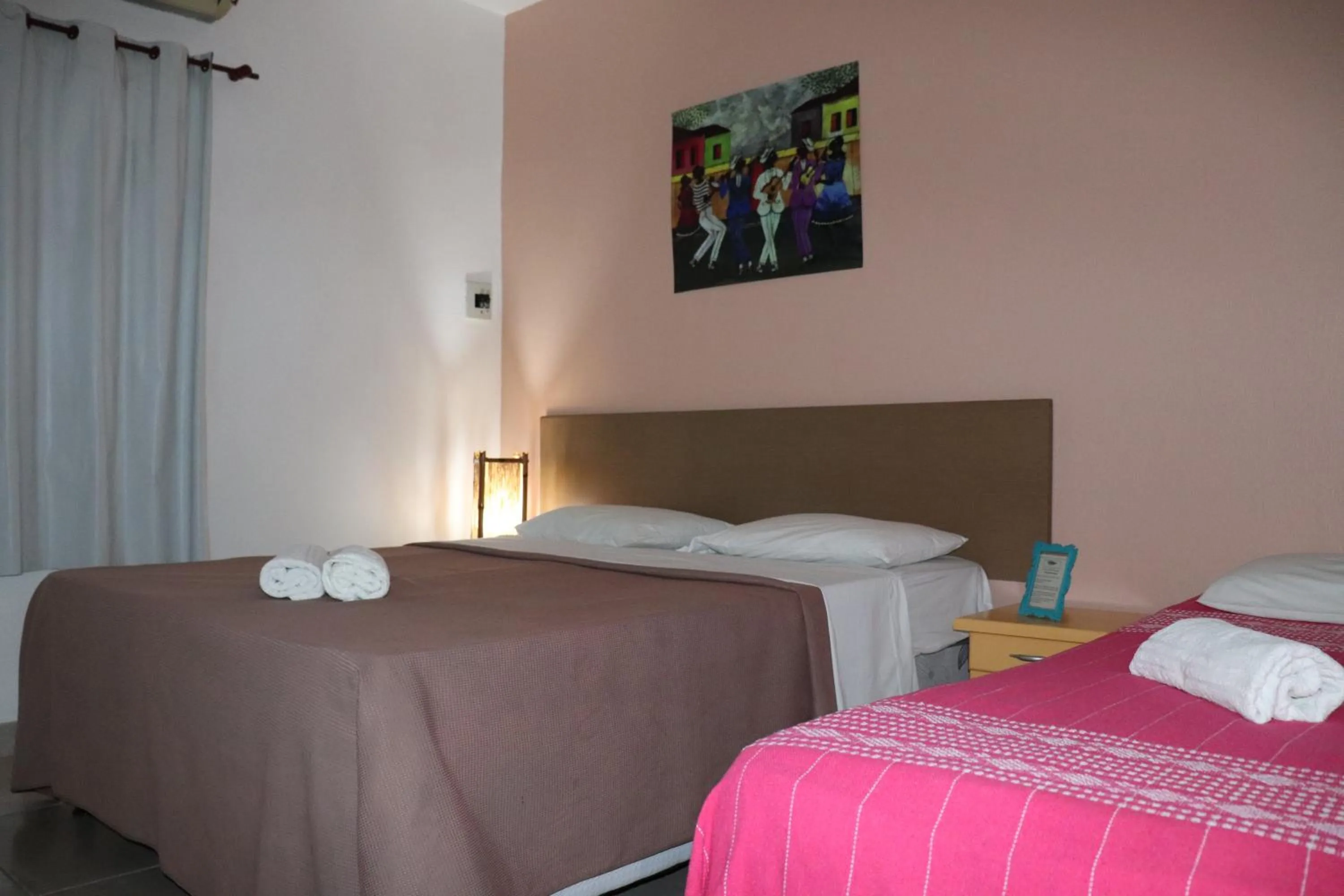 Bed in Pousada Liras da Poesia