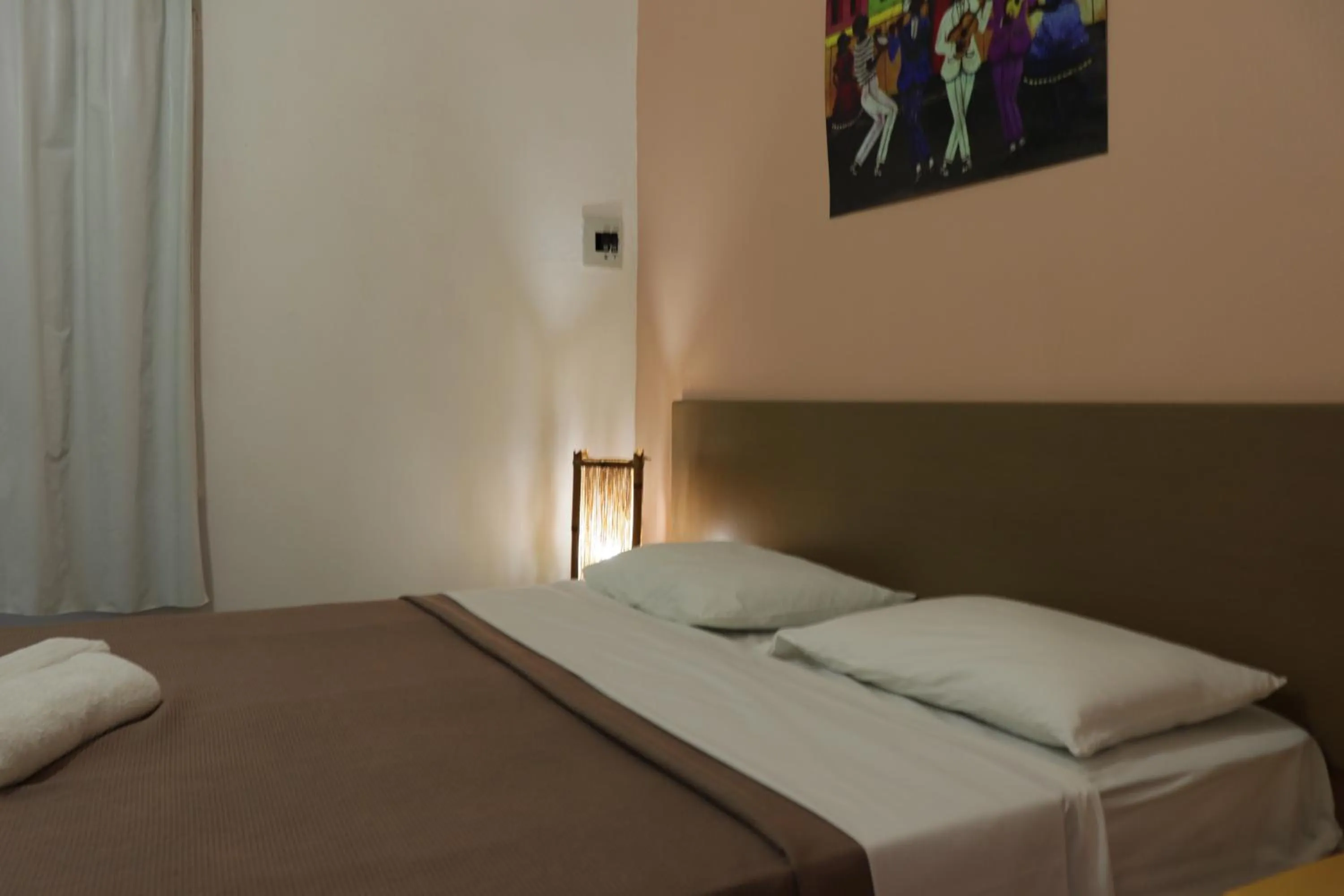 Bed in Pousada Liras da Poesia