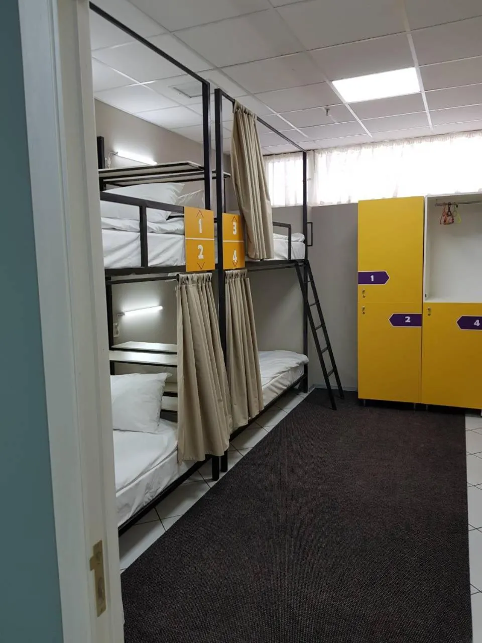 Bed in 4-Bed Male Dormitory Room in Hostel City Center
