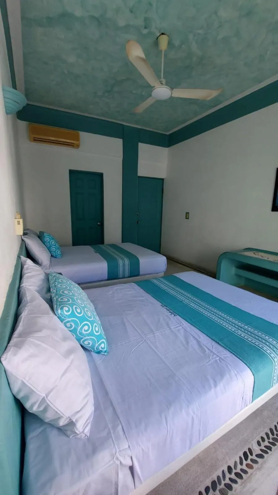 Bed in Delphinus Inn
