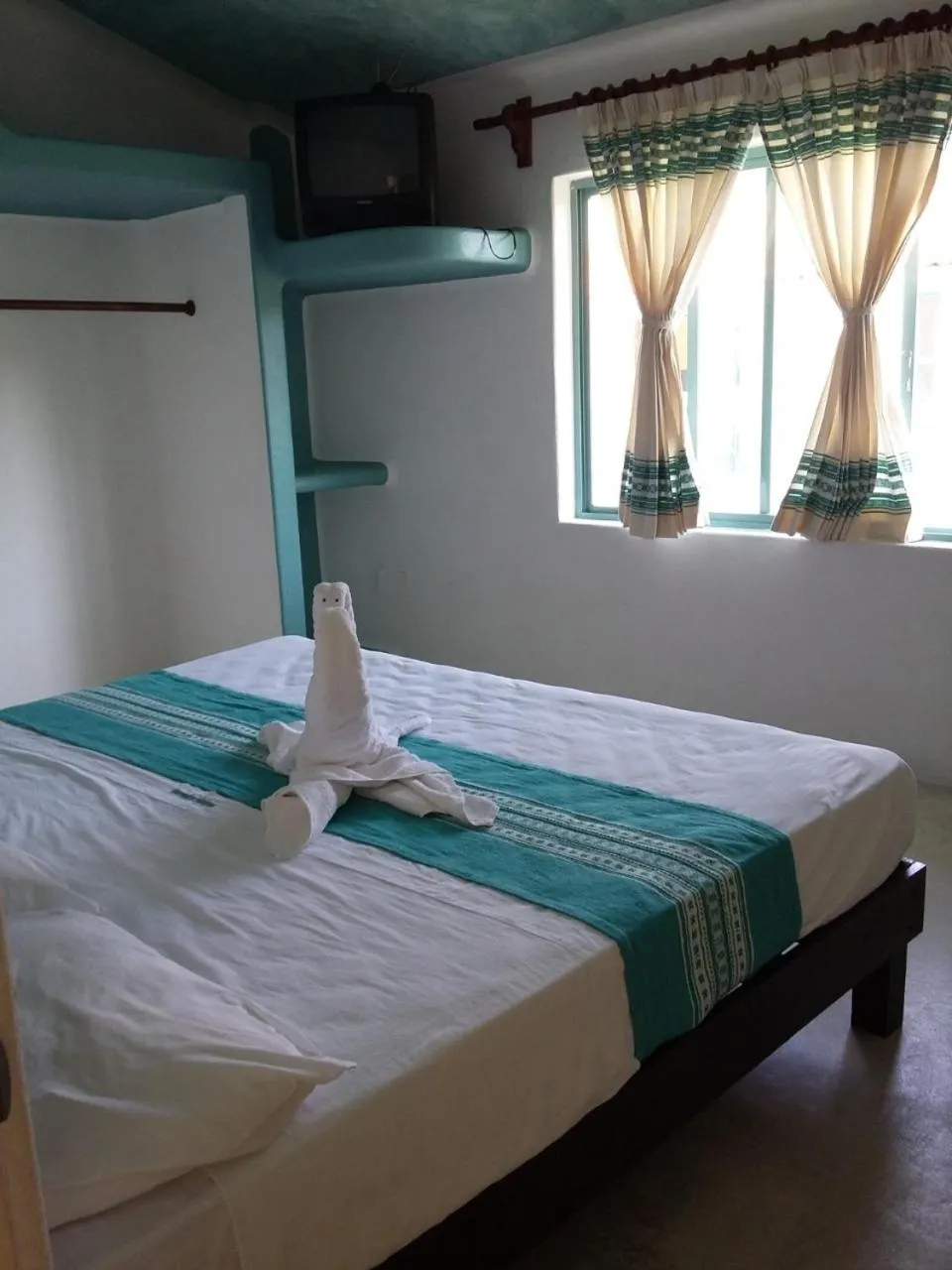 Bed in Delphinus Inn