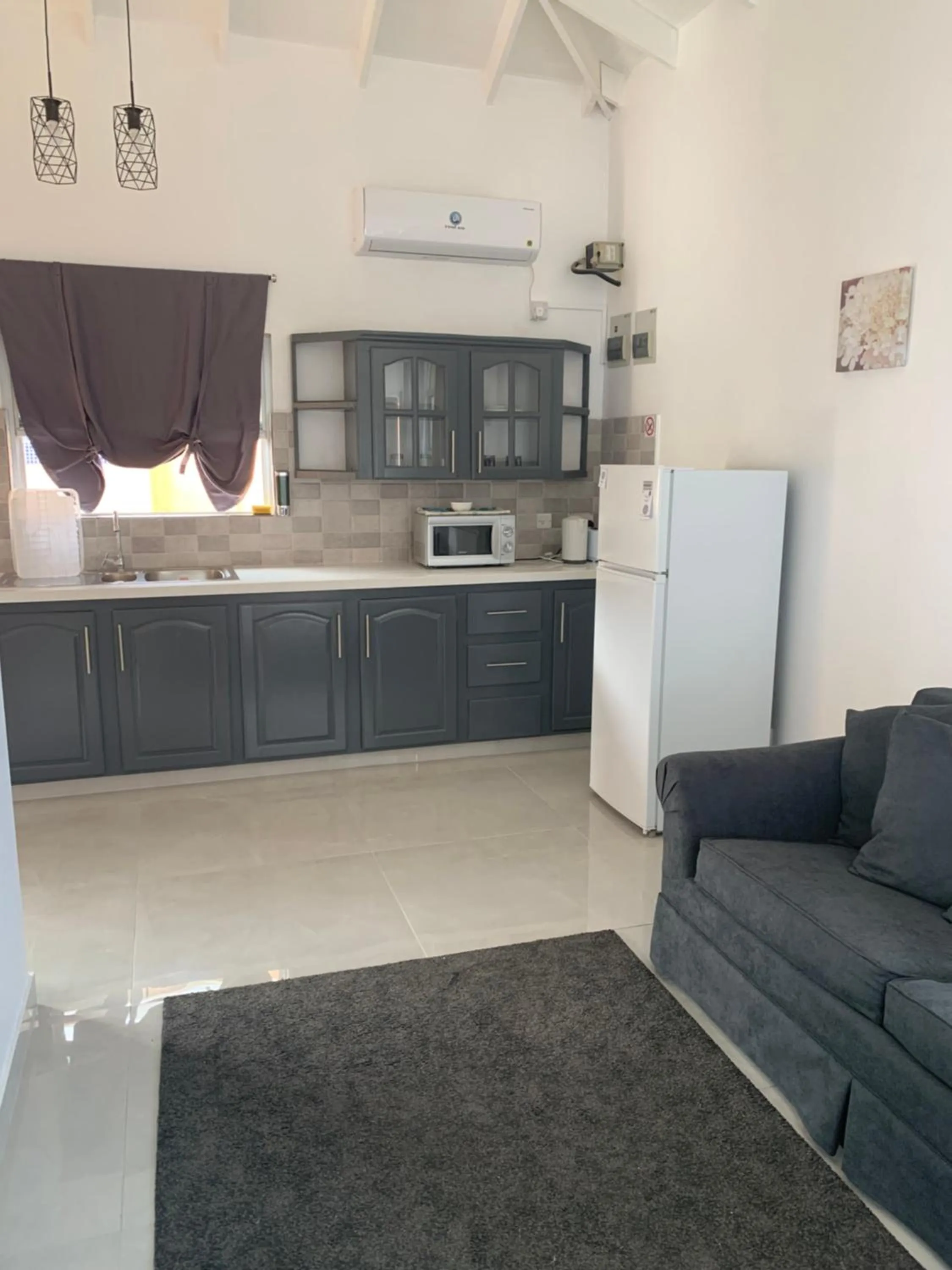 Kitchen or kitchenette in La Heliconia & Day Spa