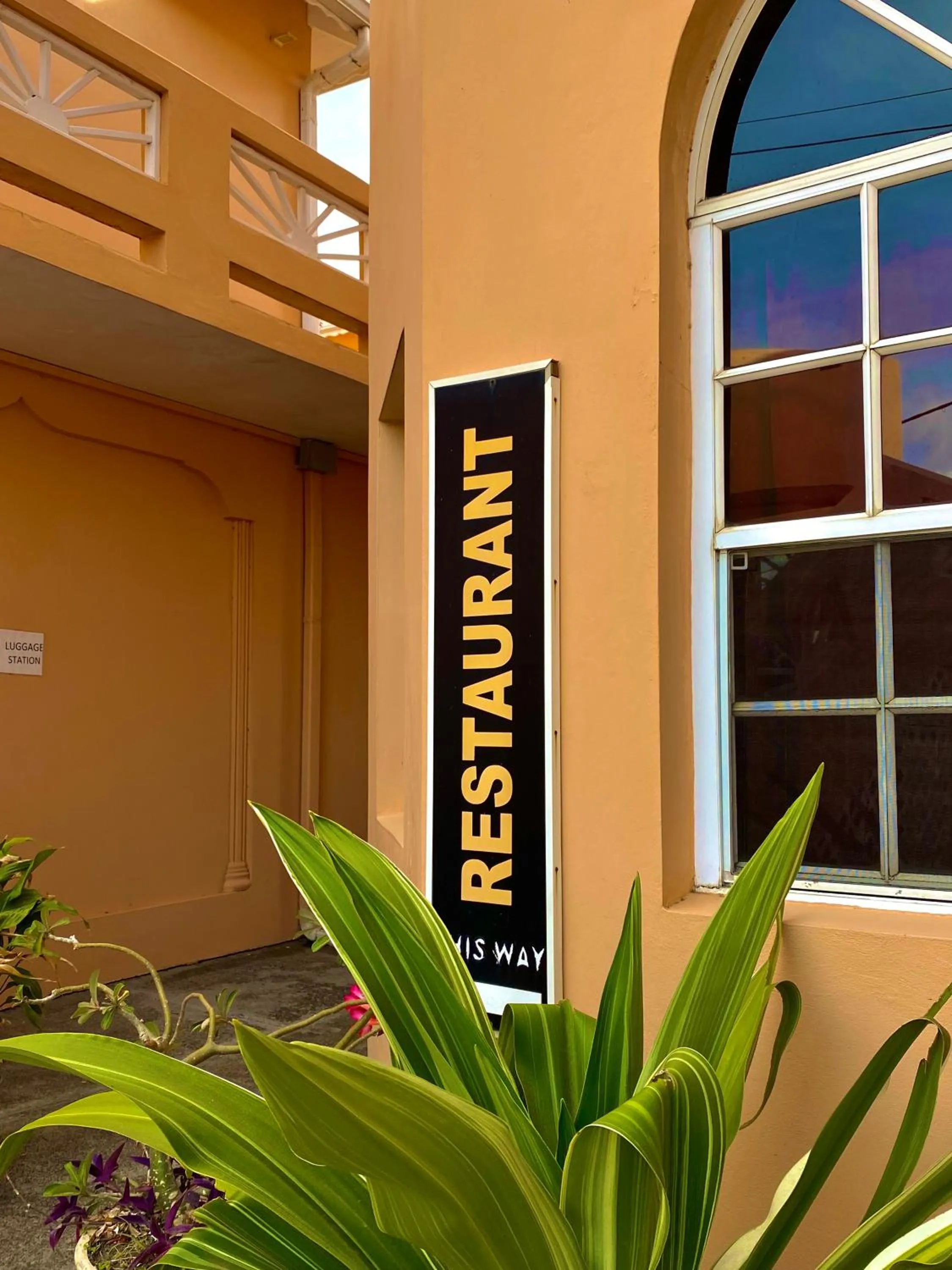 Property logo or sign in La Heliconia & Day Spa