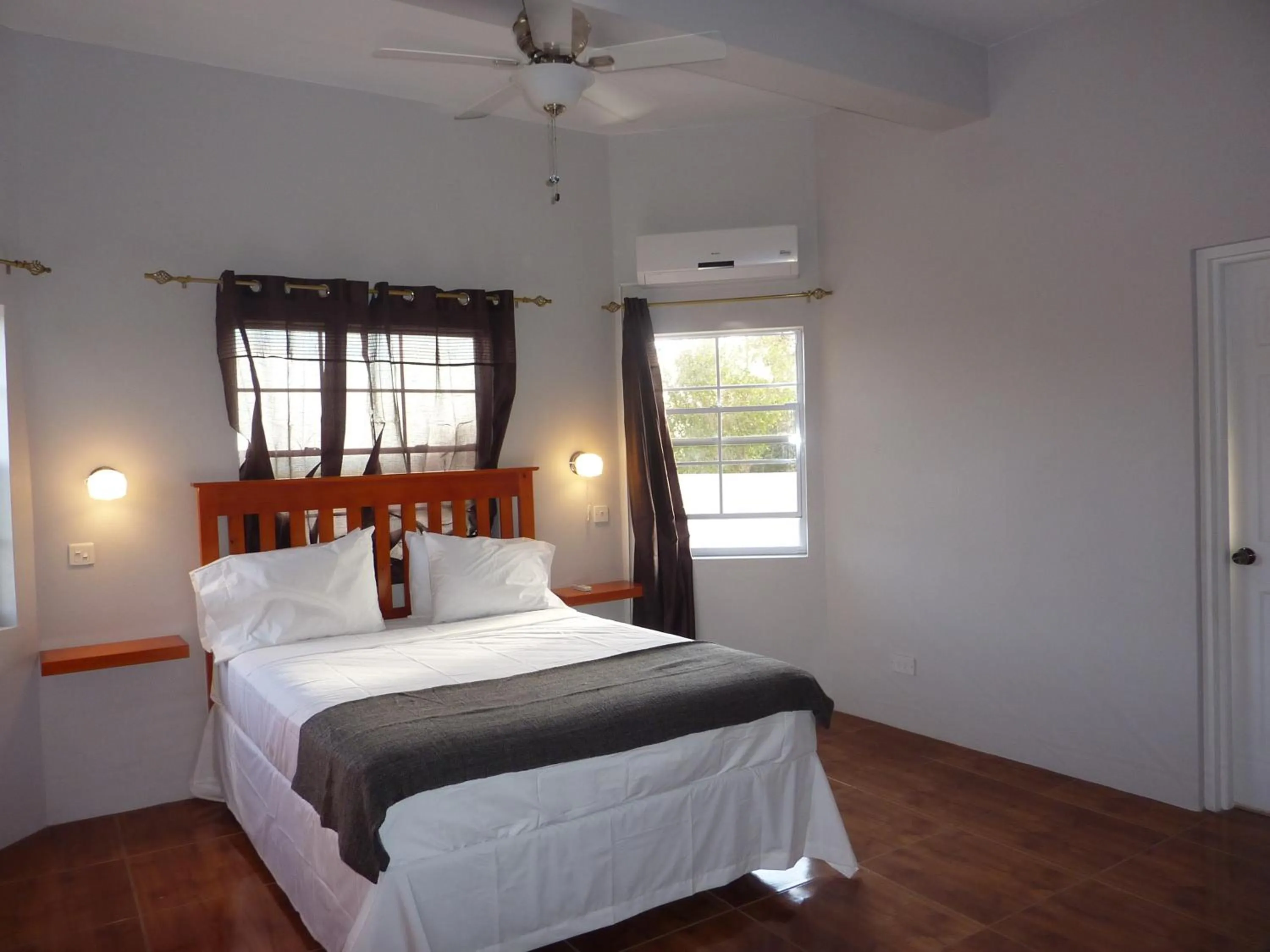 Bedroom, Bed in La Heliconia & Day Spa