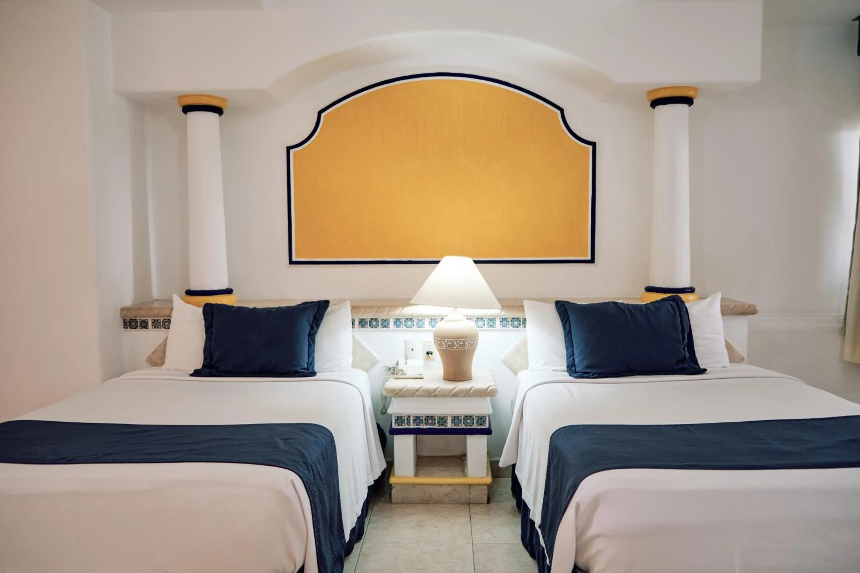 Bed in The Inn at Mazatlan