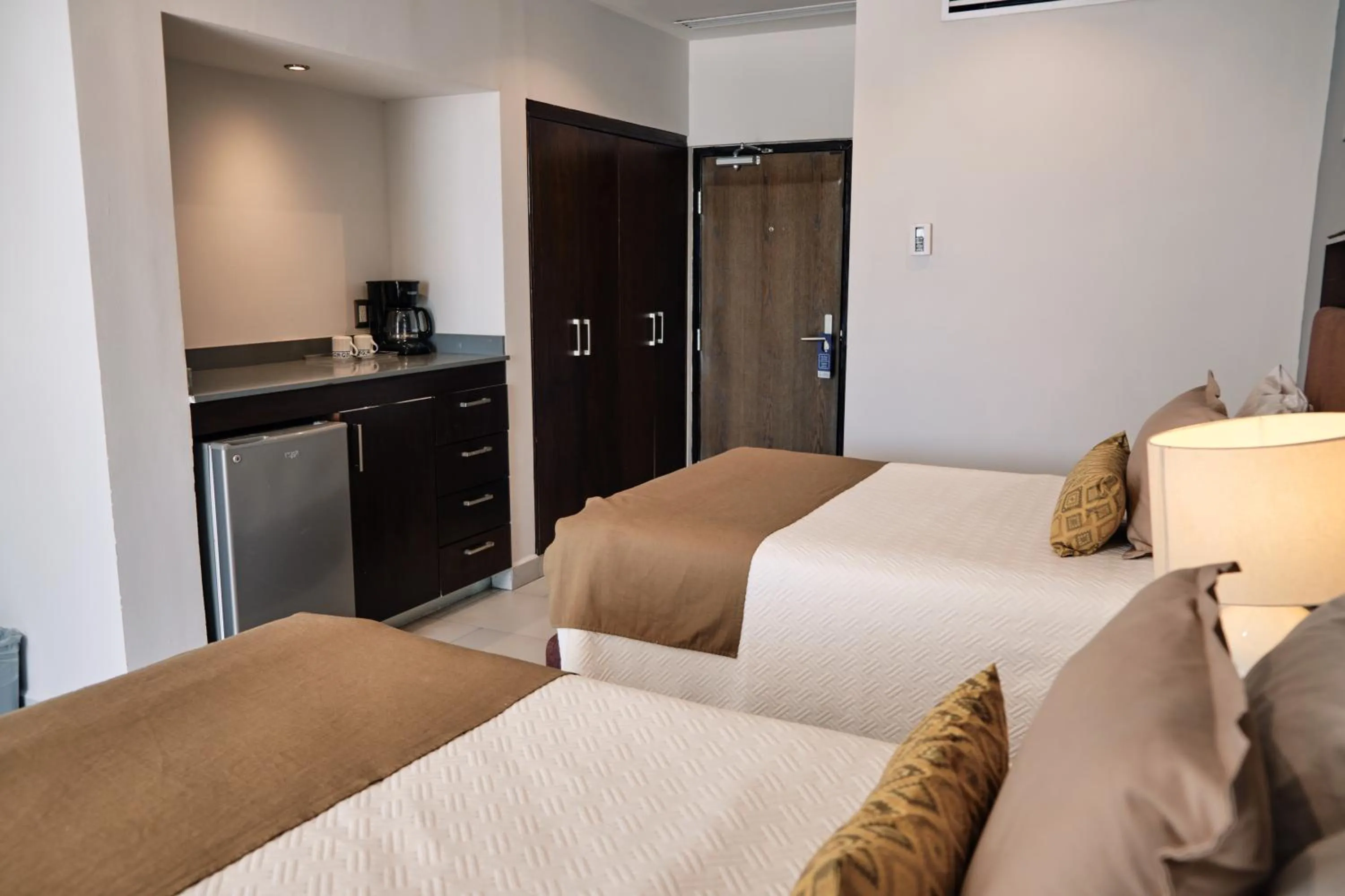 Photo of the whole room, Bed in The Inn at Mazatlan