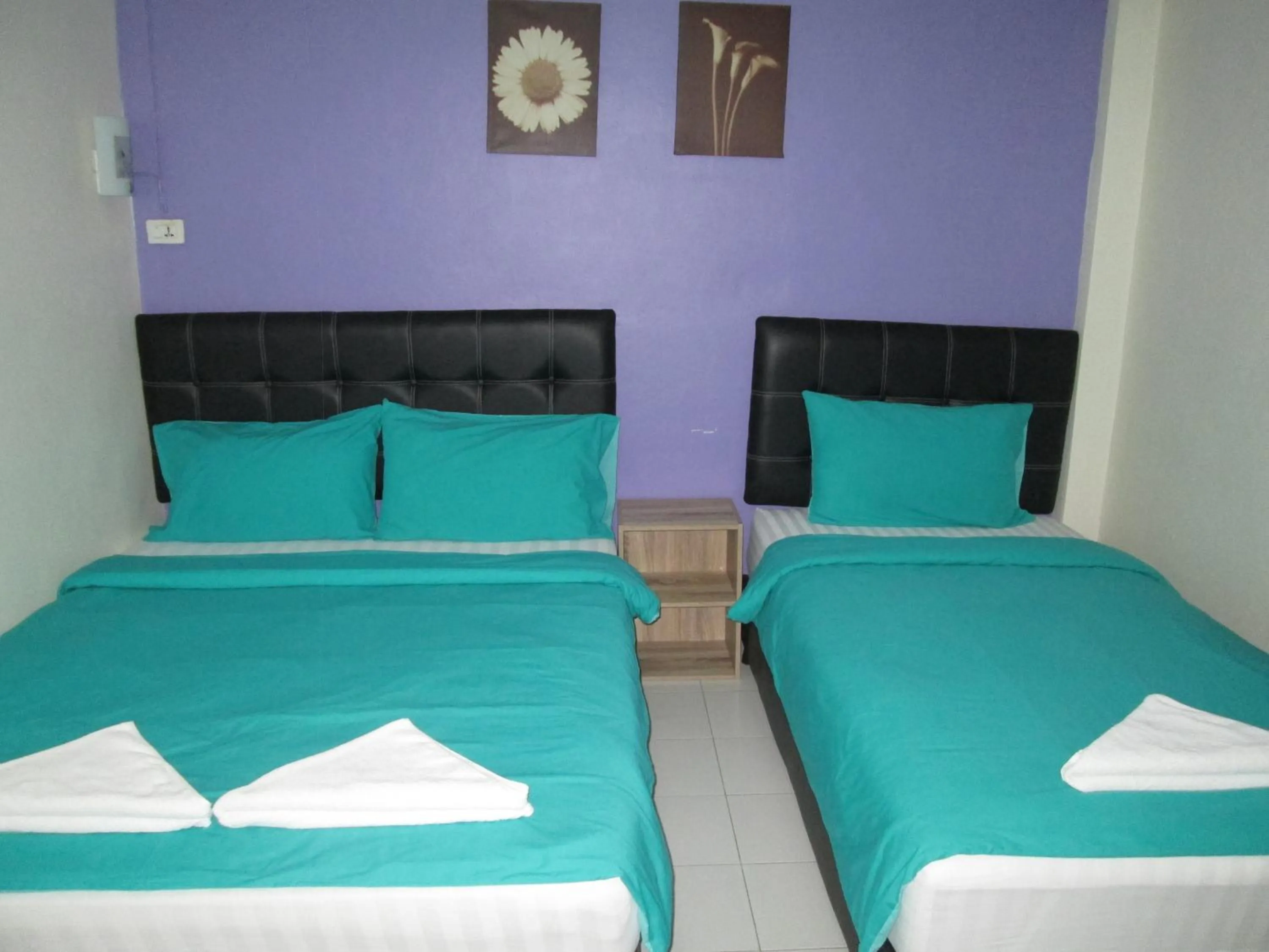 Bed in Pineapple Guesthouse