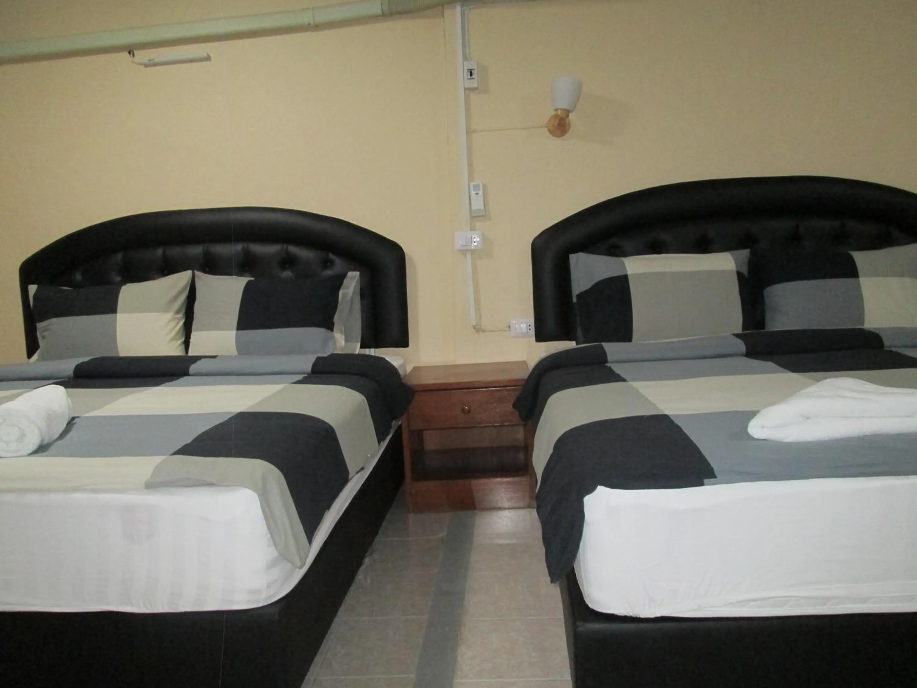 Bed in Pineapple Guesthouse