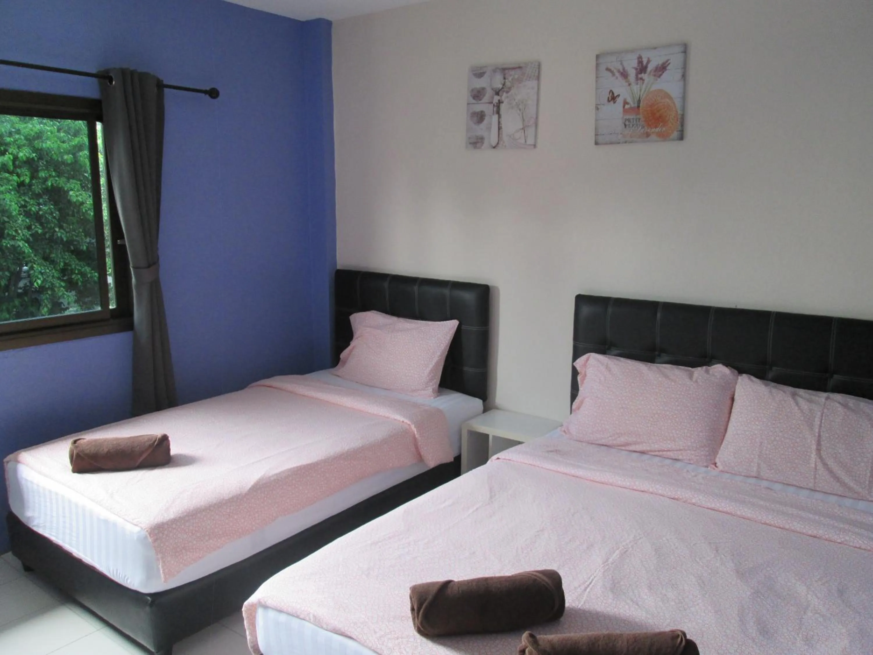 Bed in Pineapple Guesthouse