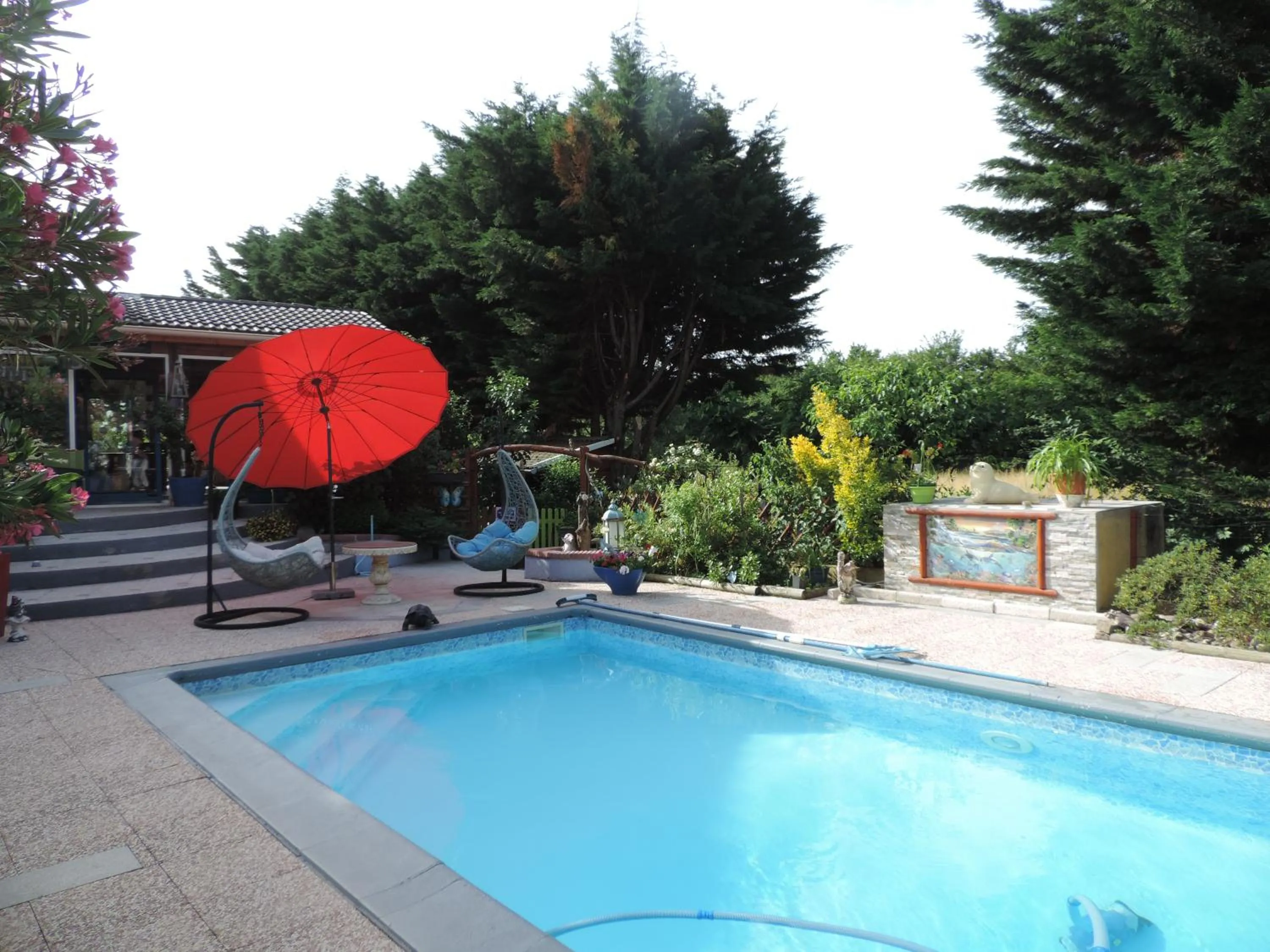 Swimming pool in Chez Papy et Mamy