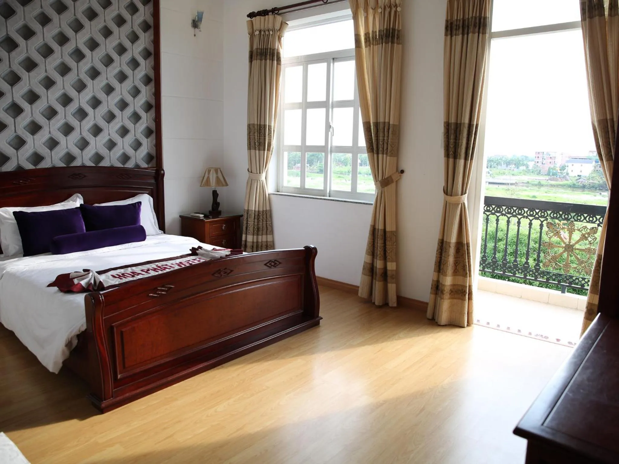 Balcony/Terrace, Bed in Hoa Phat Hotel & Apartment