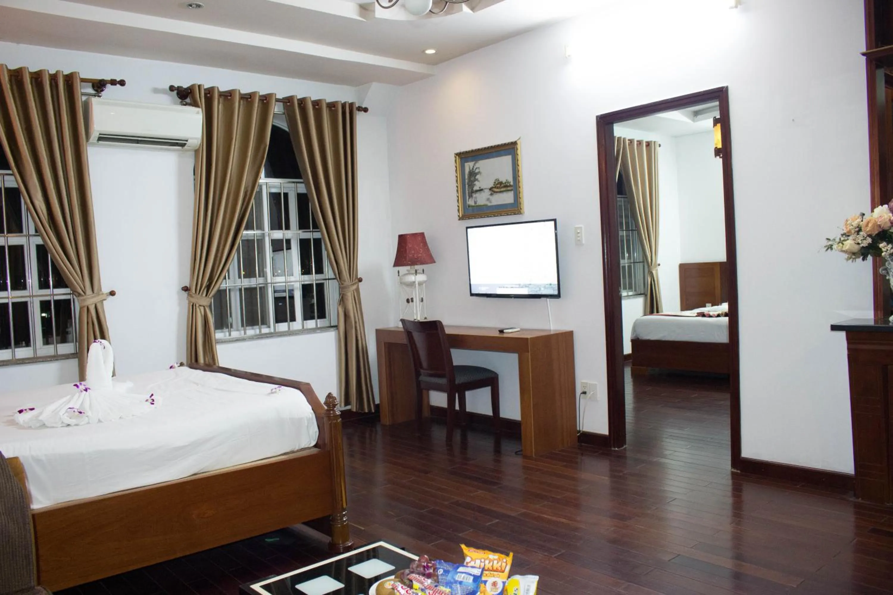 Communal lounge/ TV room, Bed in Hoa Phat Hotel & Apartment