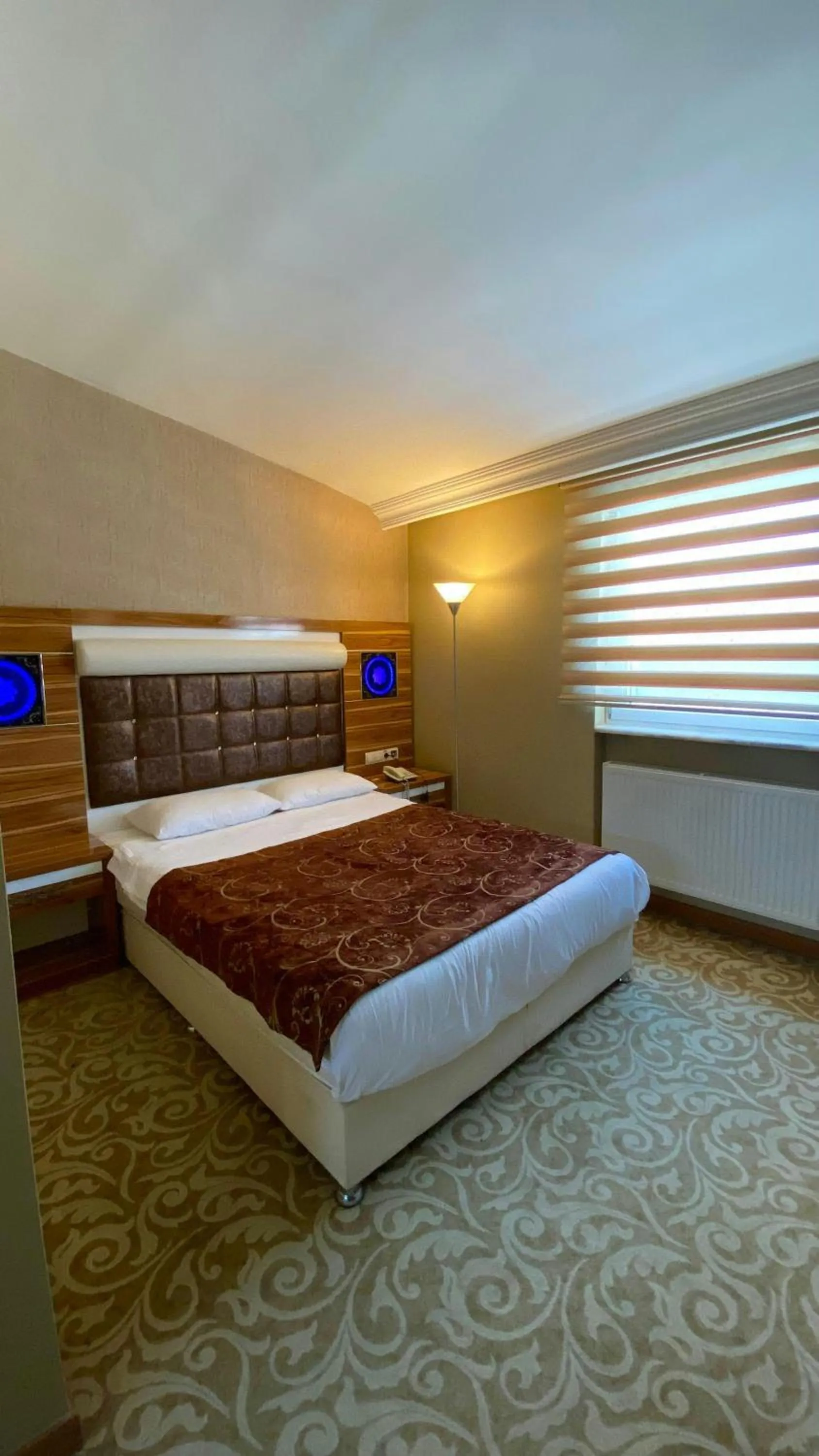Bed in Demosan Hotel