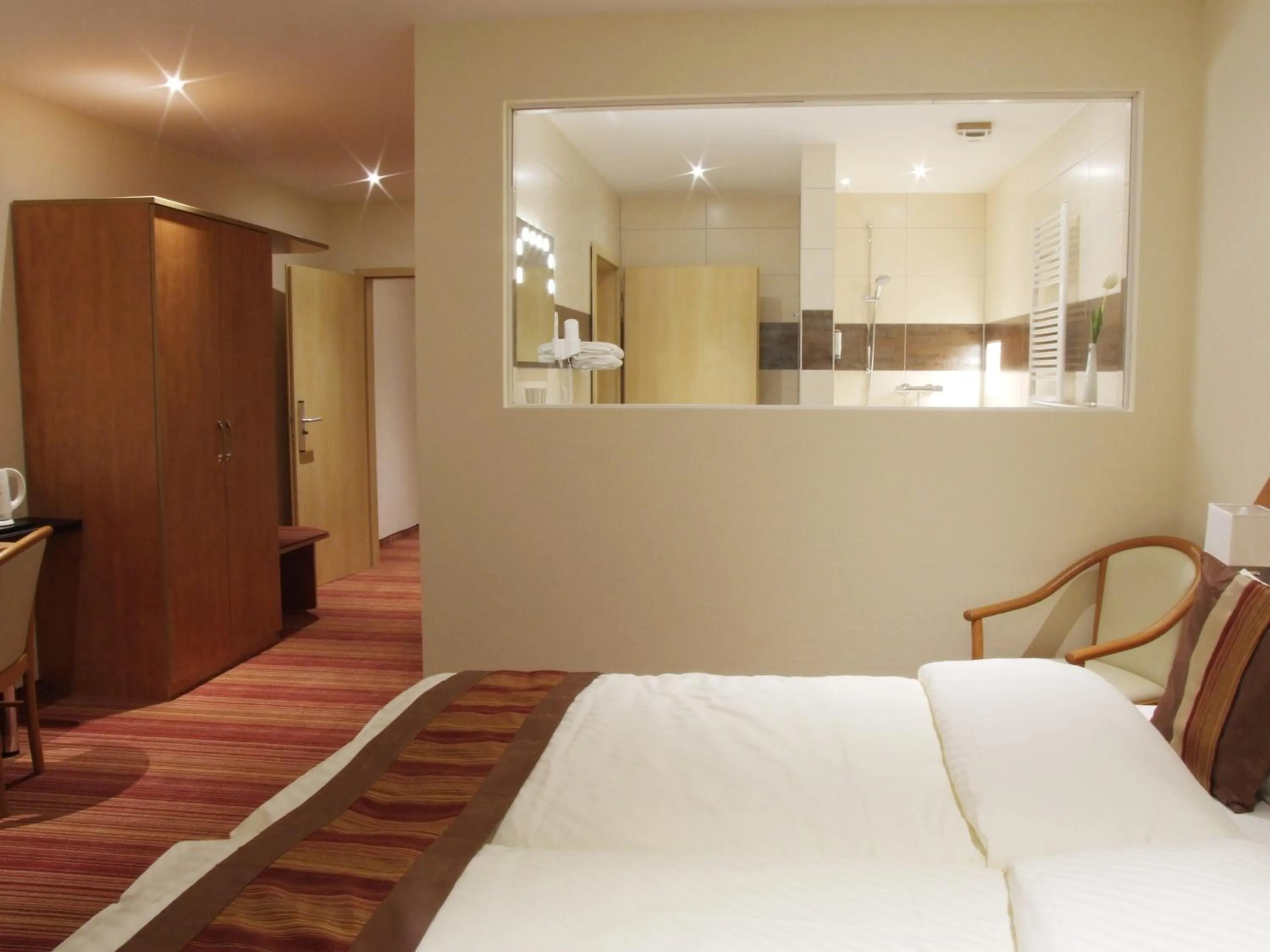 Photo of the whole room, Bed in Boutique Hotel Wolfsburg