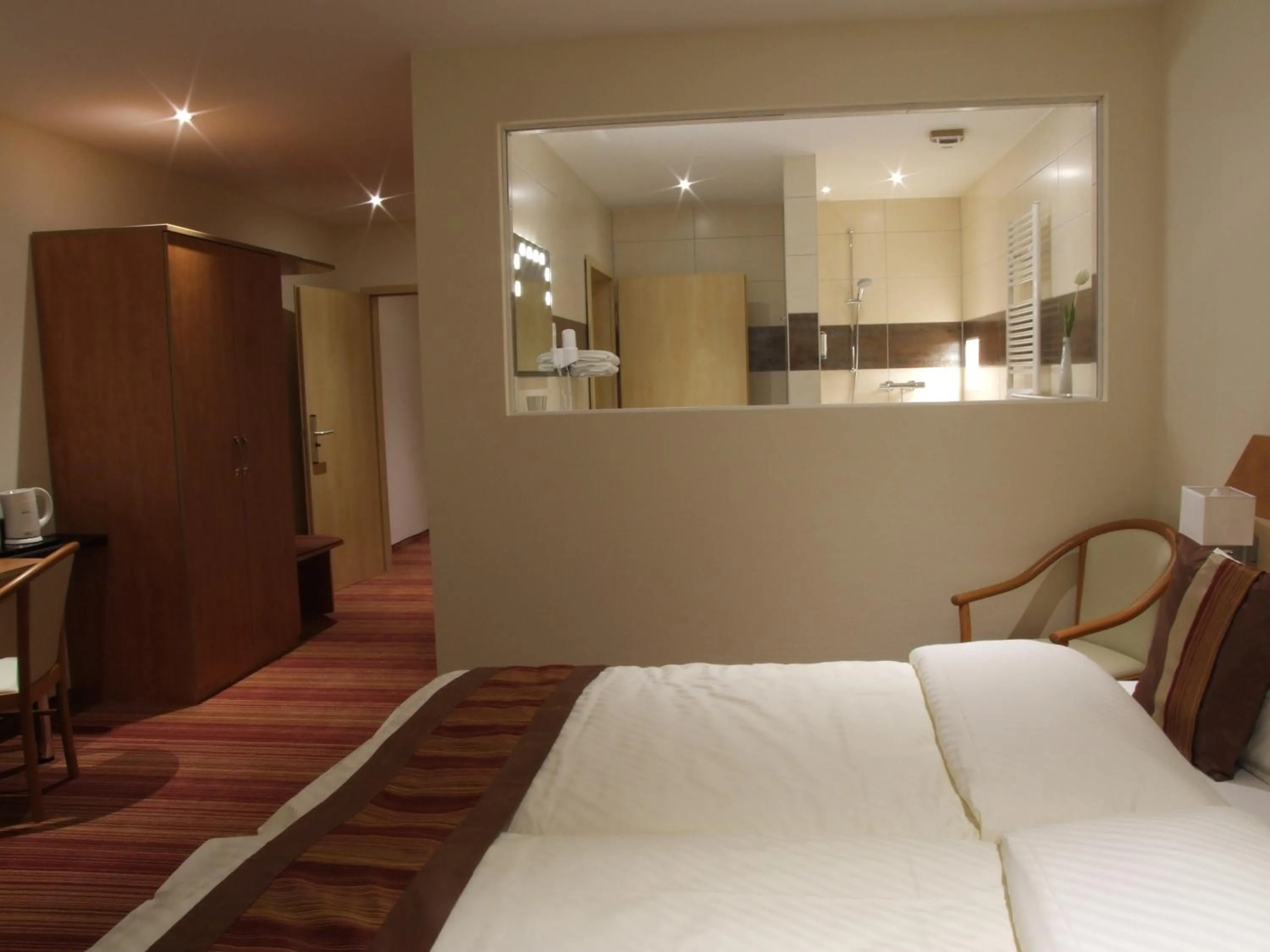 Photo of the whole room, Bed in Boutique Hotel Wolfsburg