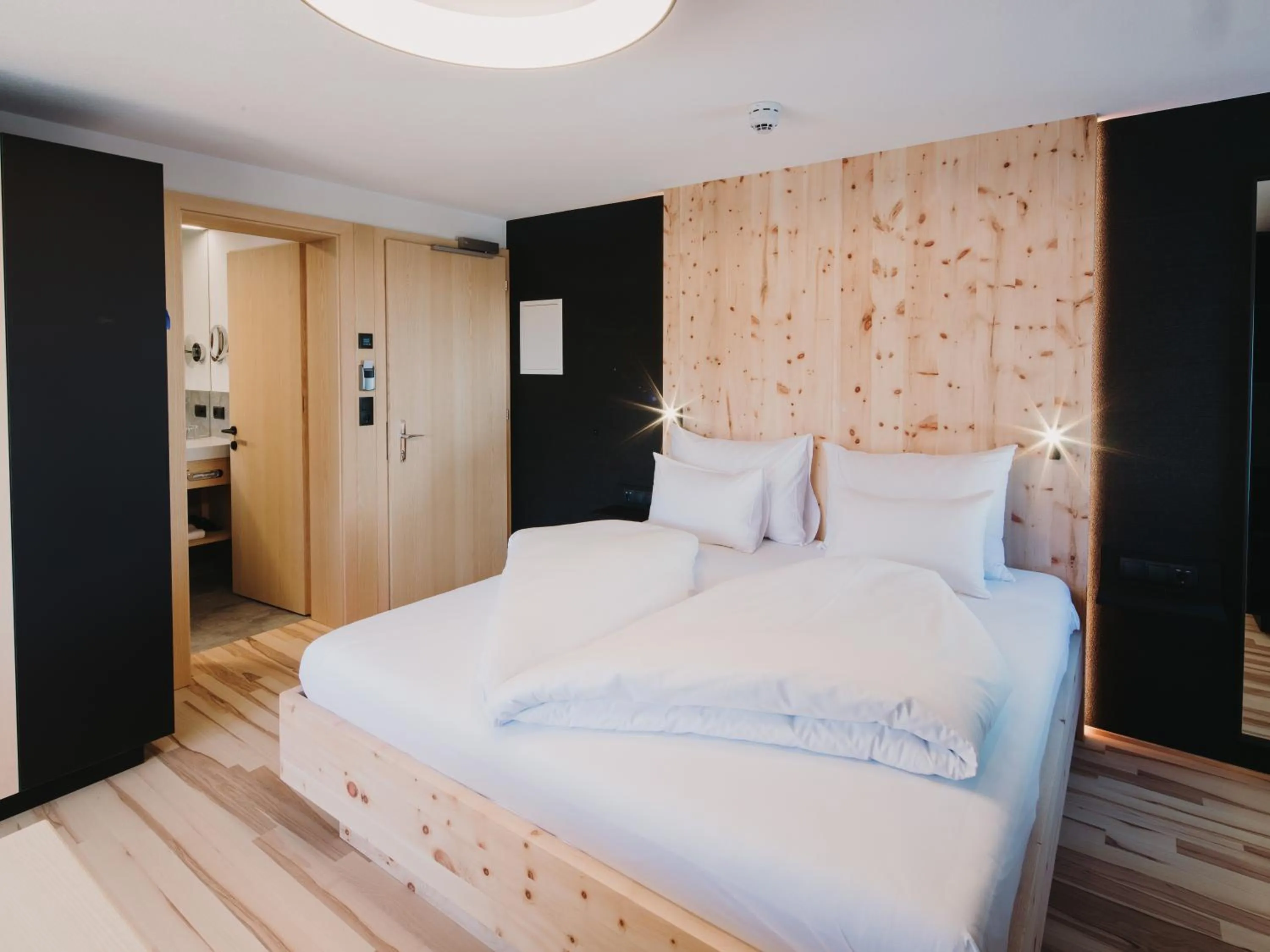 Photo of the whole room, Bed in Alpin - Studios & Suites