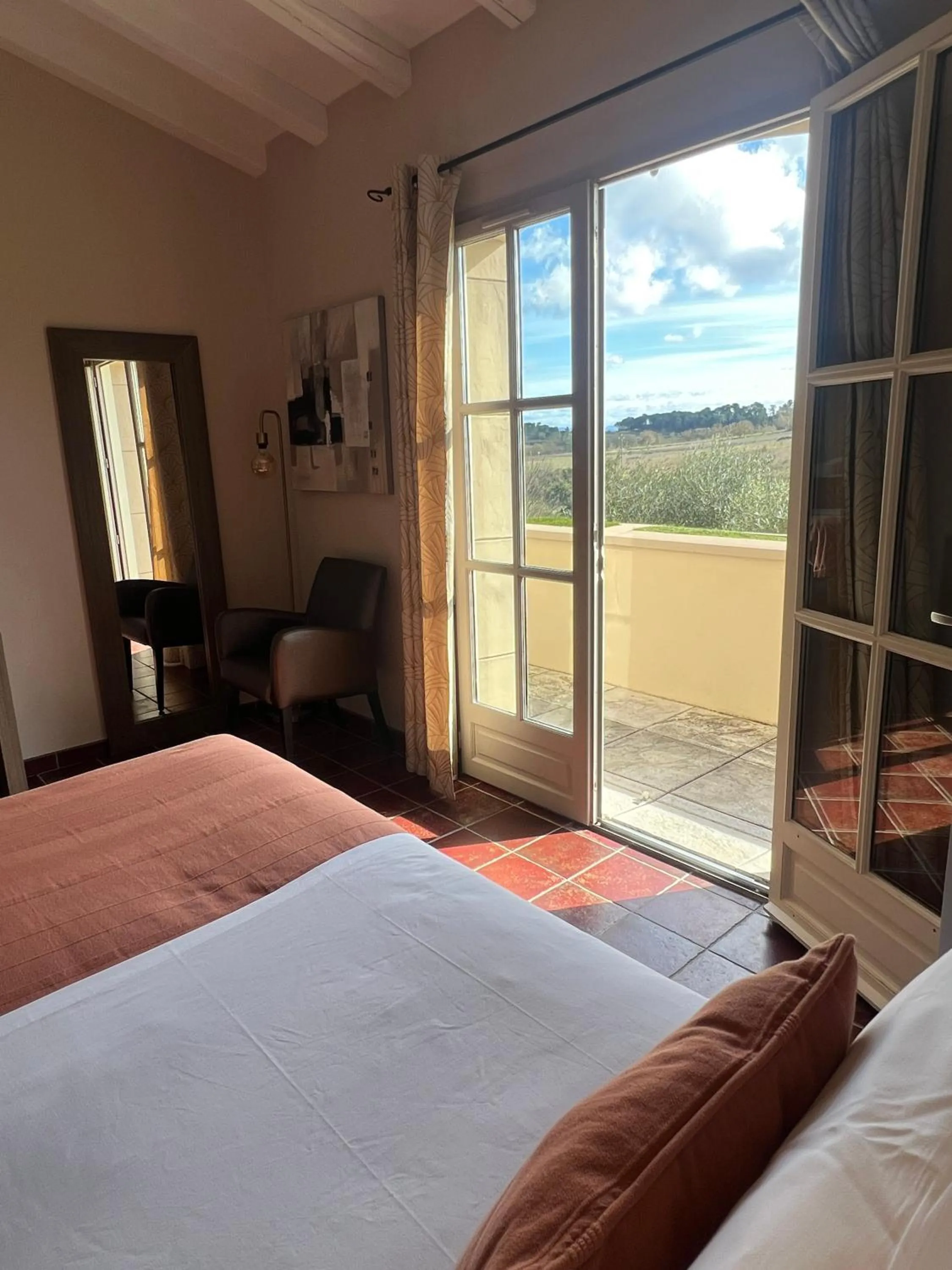 Bed in Logis Hôtel Restaurant La Bergerie