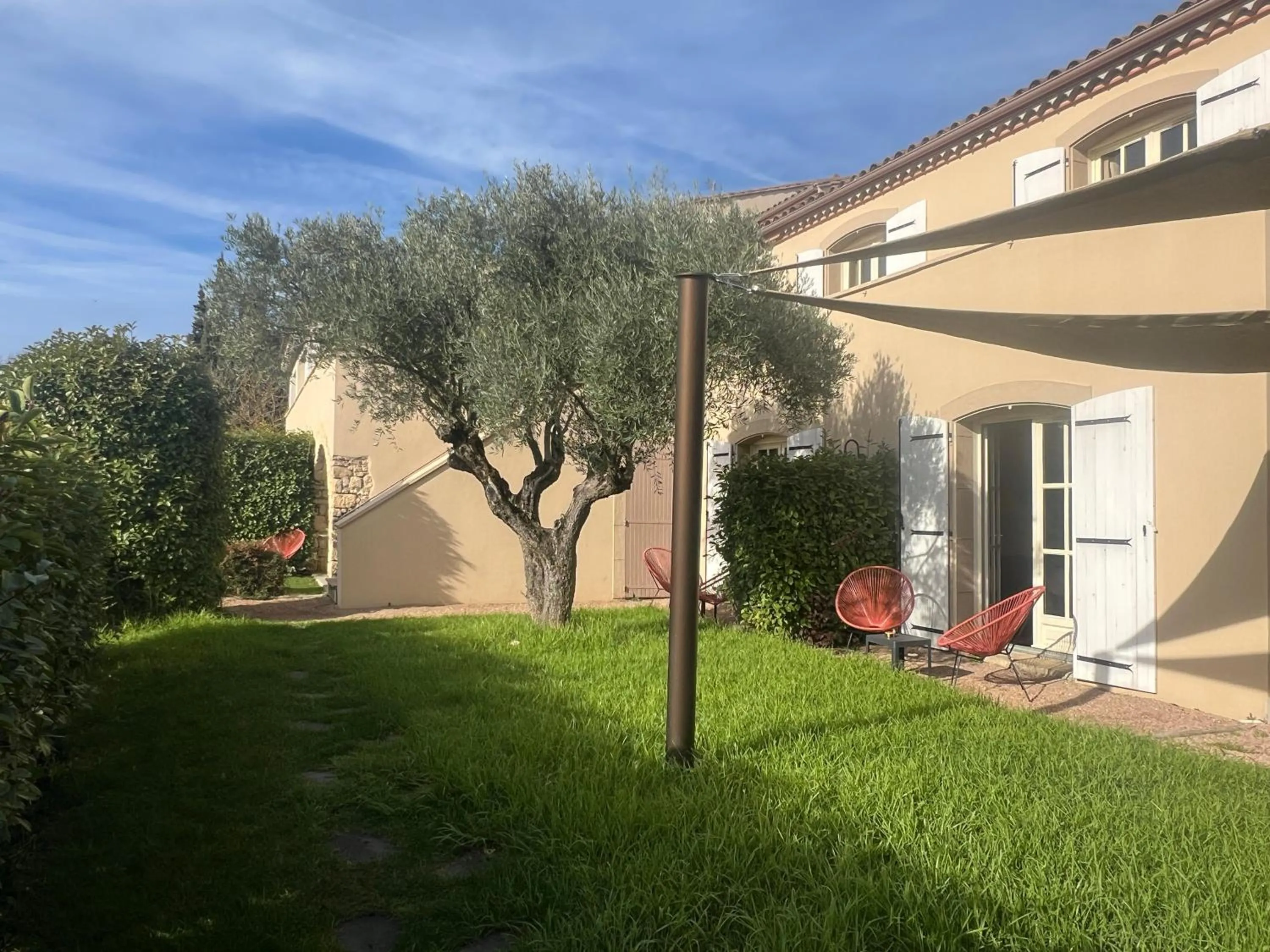 Garden in Logis Hôtel Restaurant La Bergerie