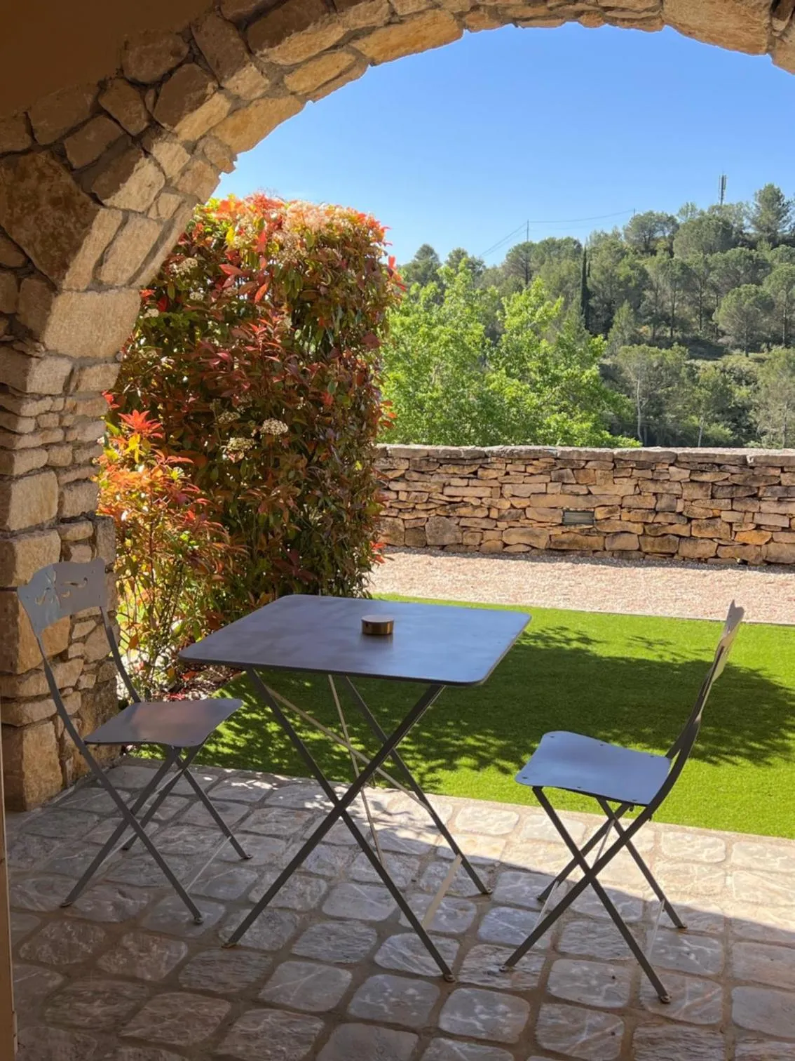 Patio in Logis Hôtel Restaurant La Bergerie