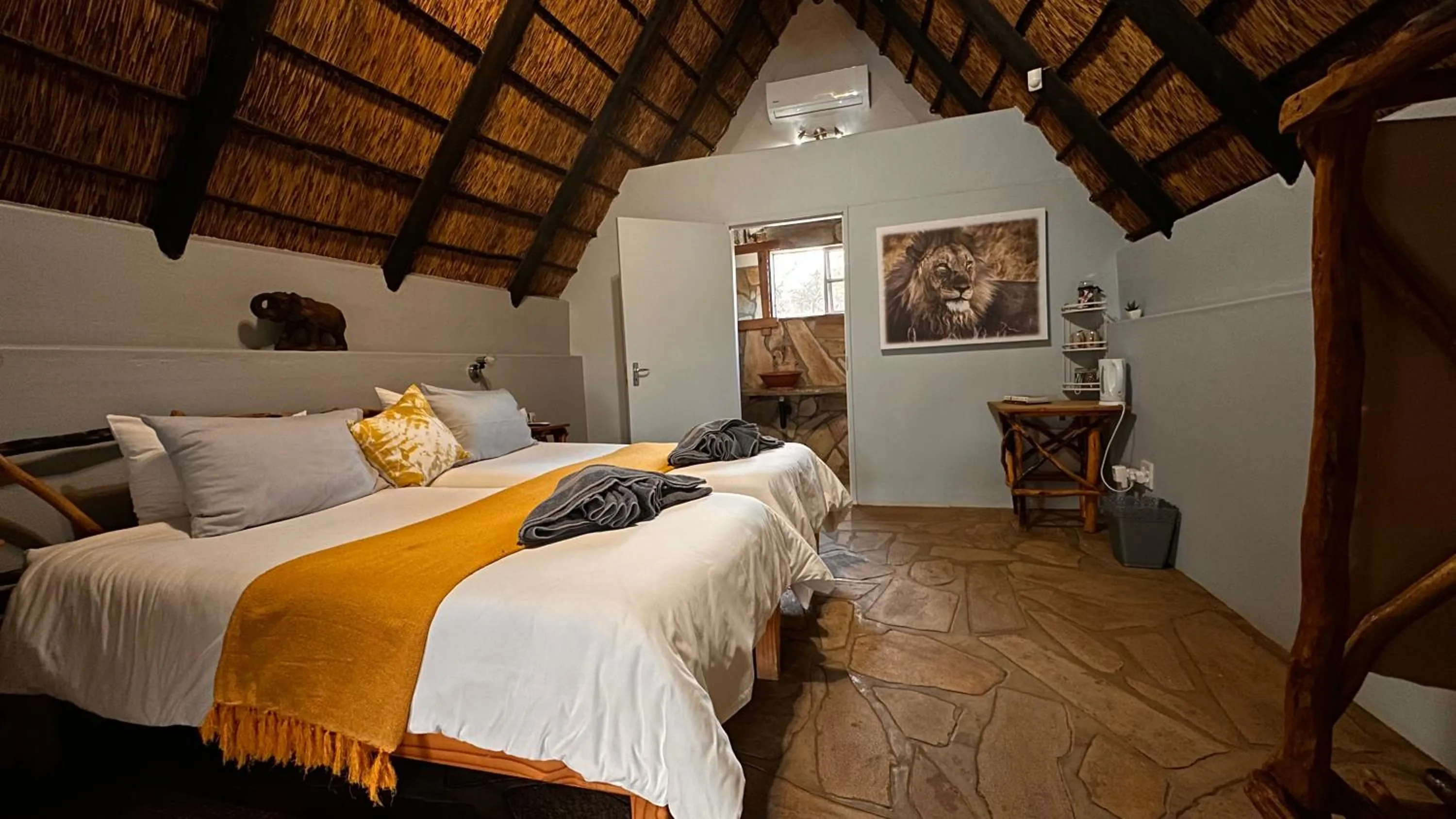 Bed in Ohange Namibia Lodge