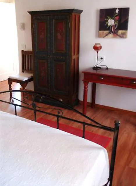 Seating area, Bed in Albergo Julienne