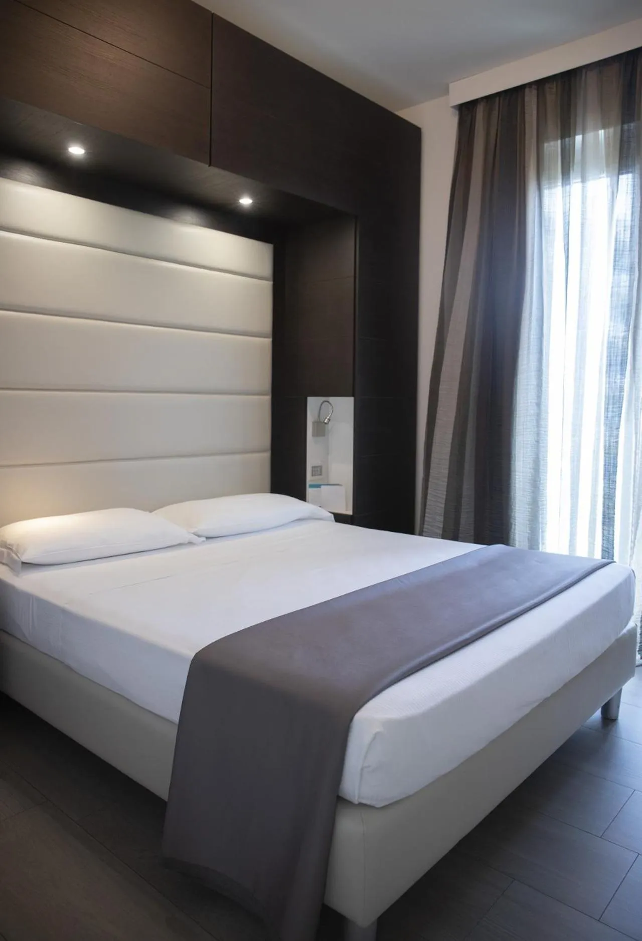 Bed in Smeraldo Suites & Spa