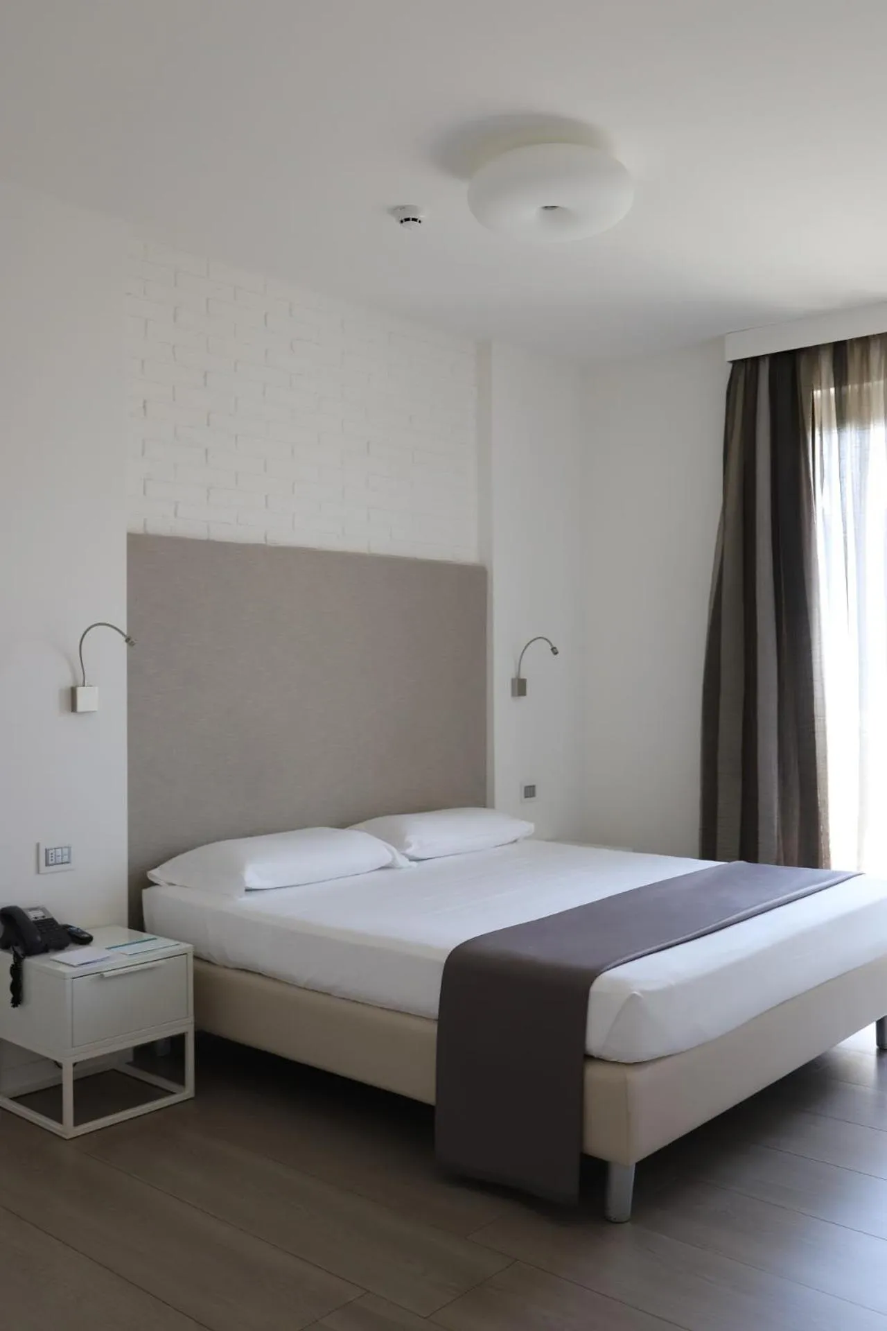 Bed in Smeraldo Suites & Spa