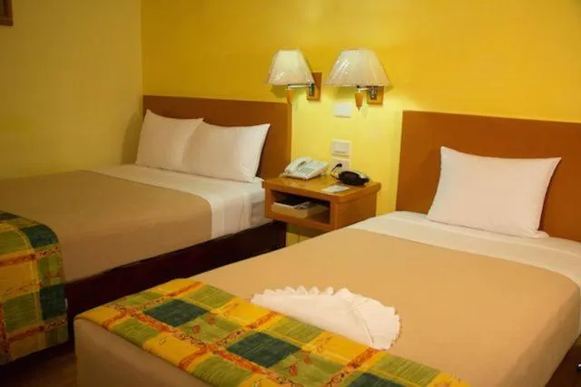 Bed in Hotel Madan Cárdenas