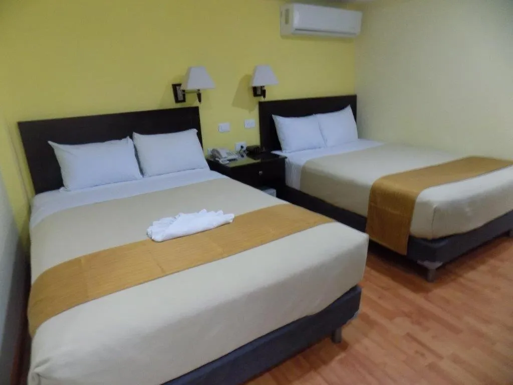 Bed in Hotel Madan Cárdenas