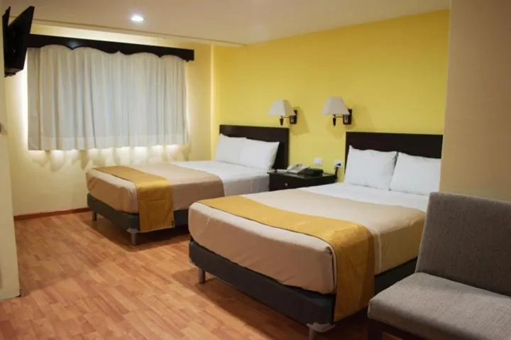 Bed in Hotel Madan Cárdenas