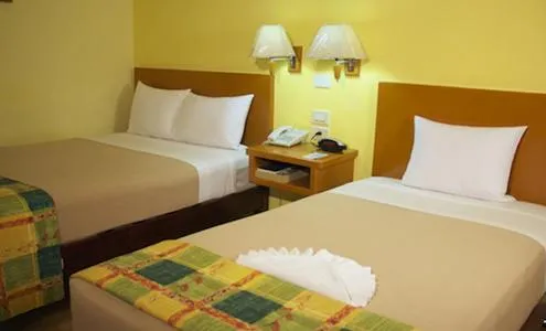 Bed in Hotel Madan Cárdenas