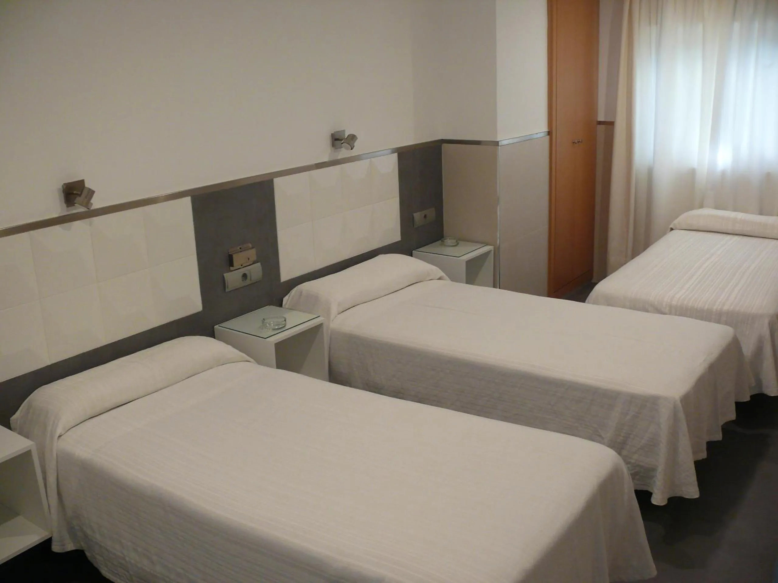 Bed in Hostal La Hispanidad