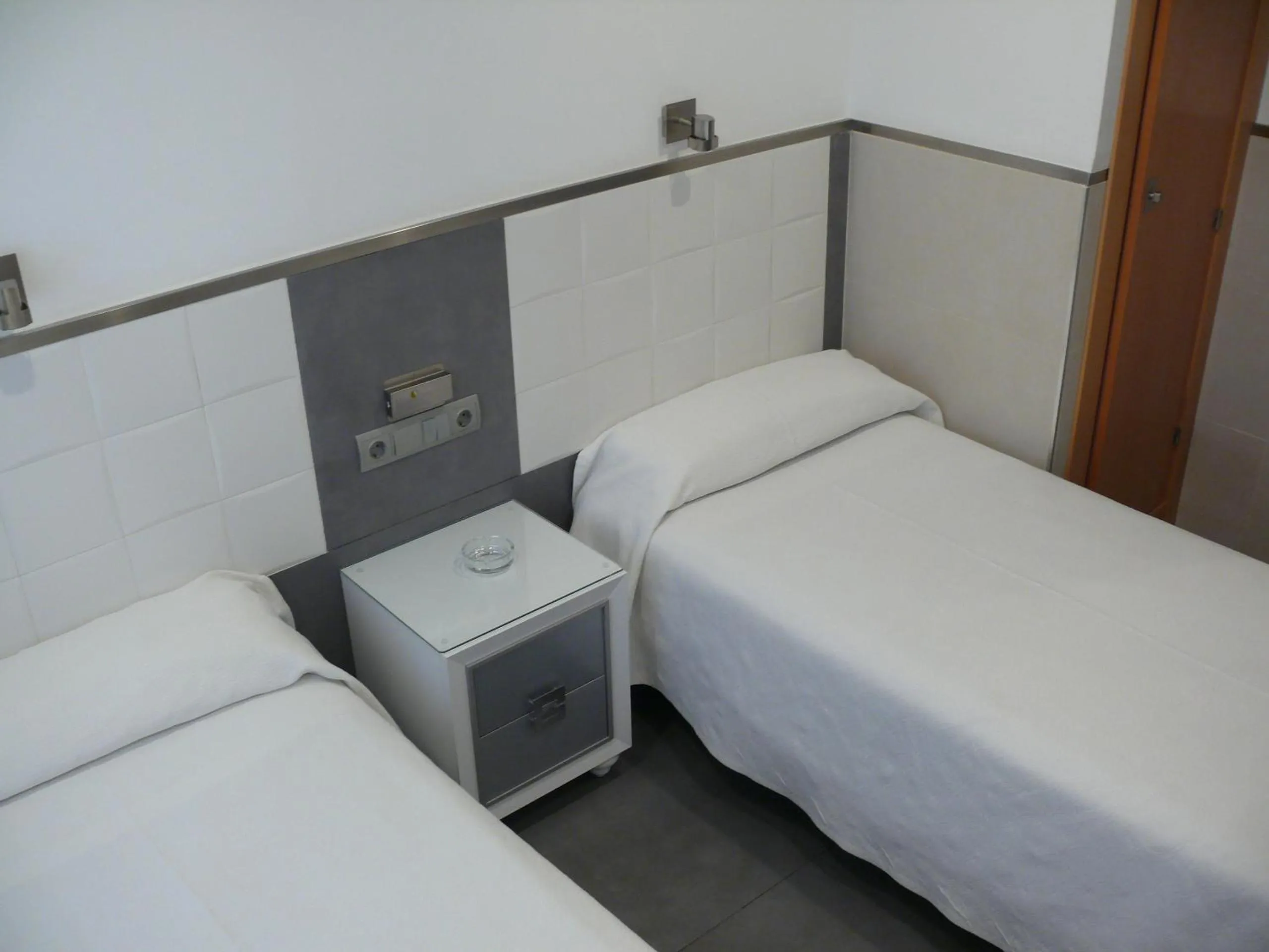 Bed in Hostal La Hispanidad