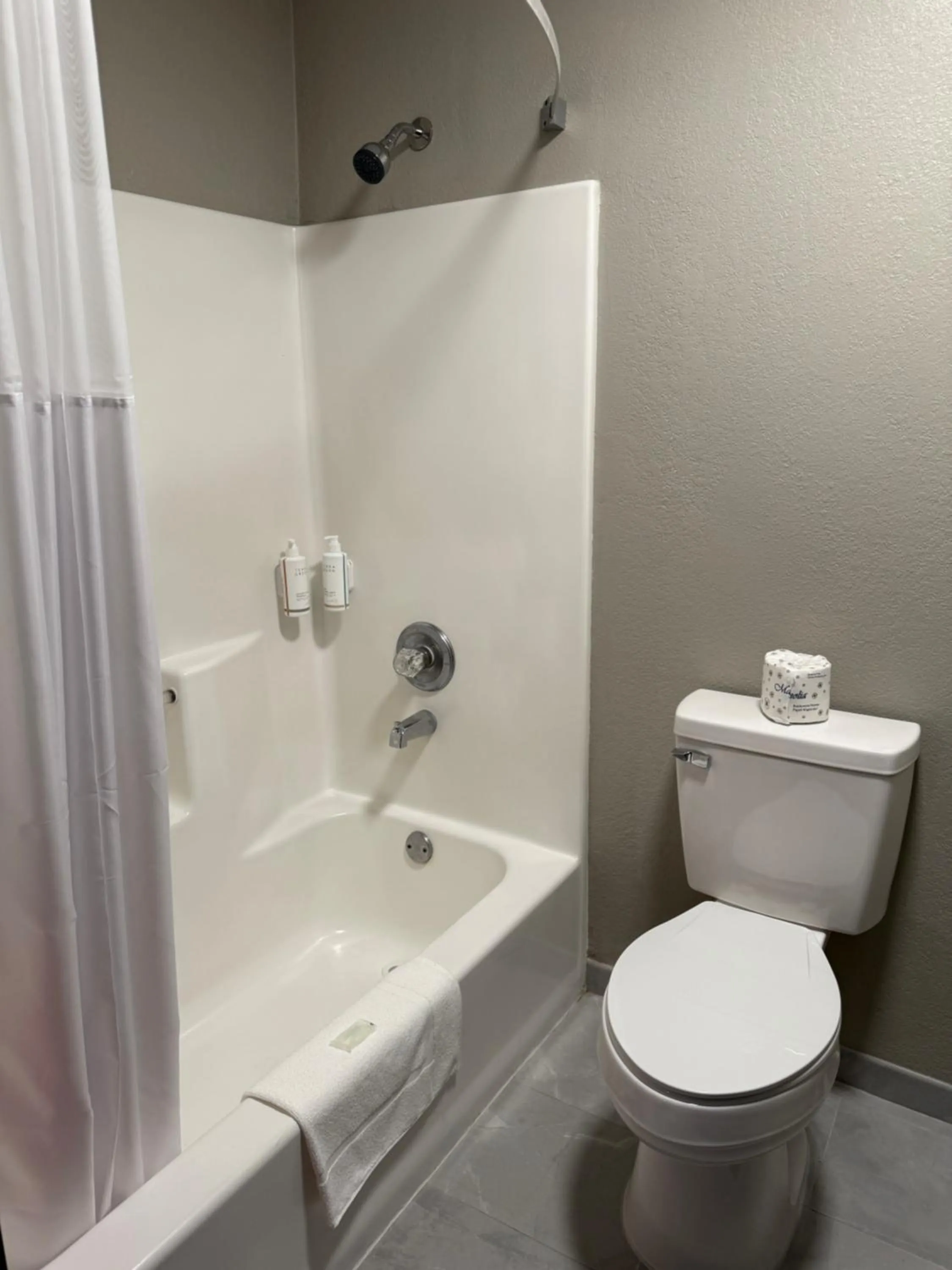 Toilet in Super 8 by Wyndham Richfield Cleveland